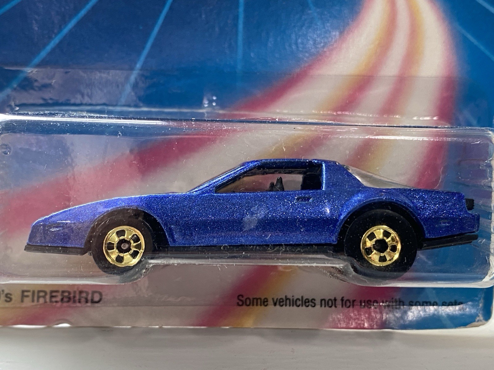 Hot Wheels ’80’s Firebird, Blue and Hot Bird, Black — 2 car set w/gold wheels