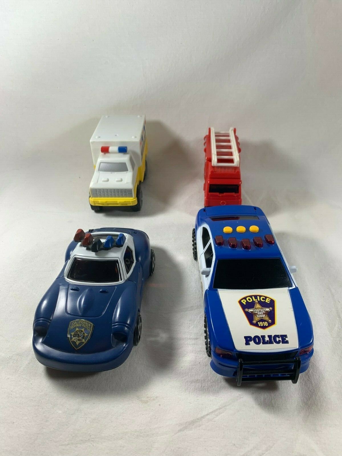 Lot of 4 Safety Service Toy Cars Police Fire Rescue Ambulance Emergency Response