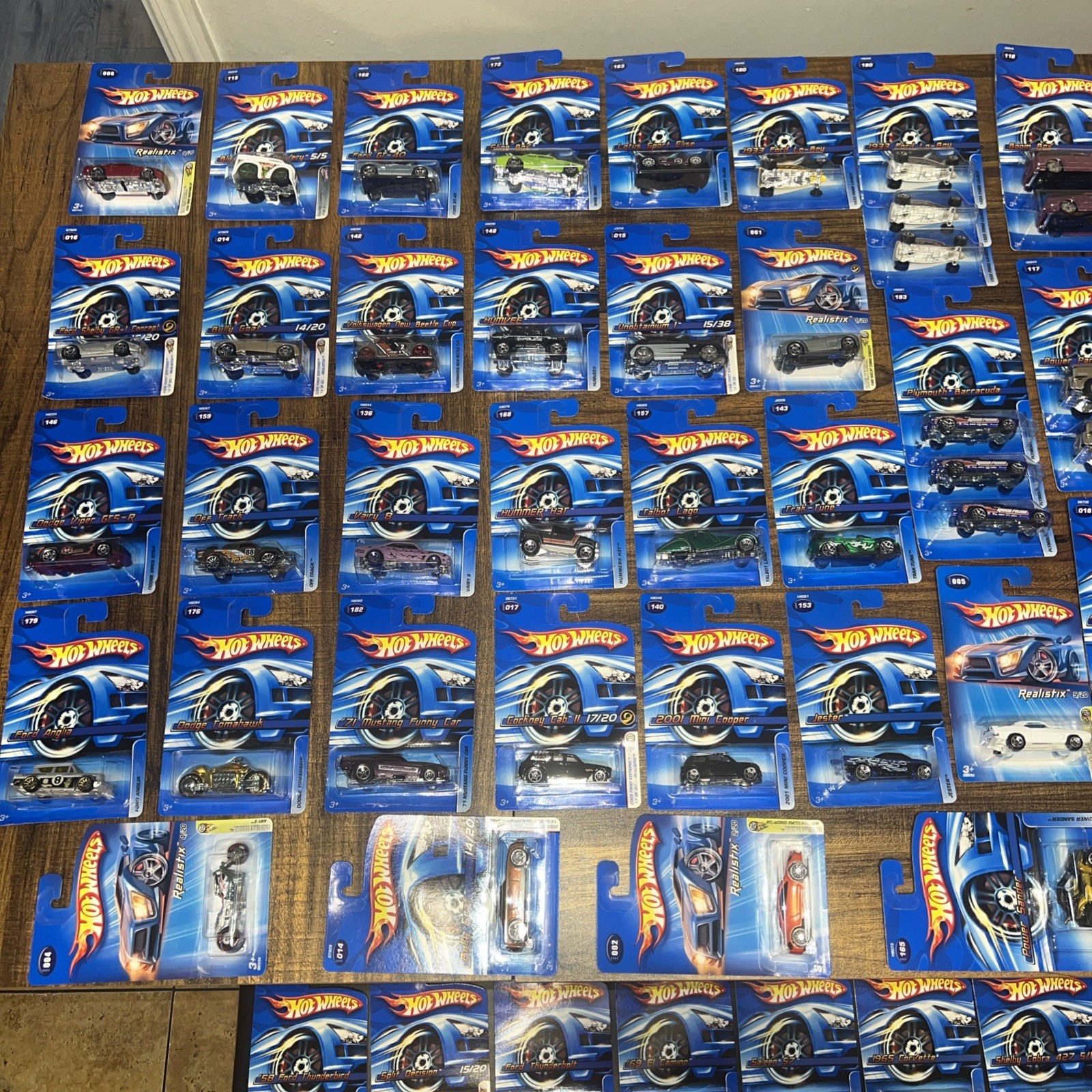 Lot of 71 Hot Wheels 2005 2006 Sealed Blue Cards First Editions Realistix