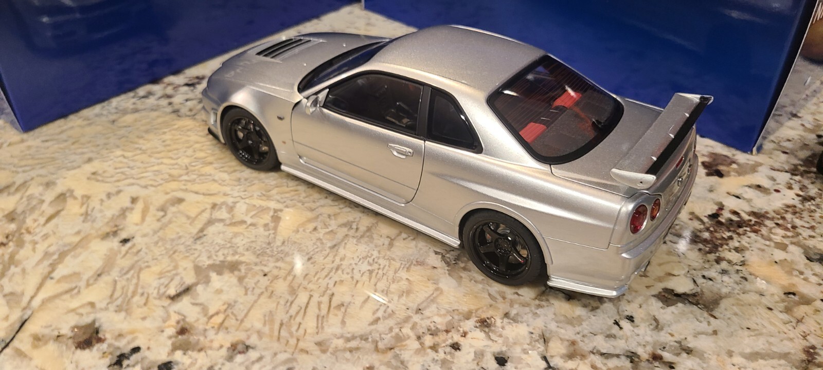 Nissan Skyline GT-R (R34) Z-Tune, Z-Tune Silver in 1:18 scale by AUTOart 77461