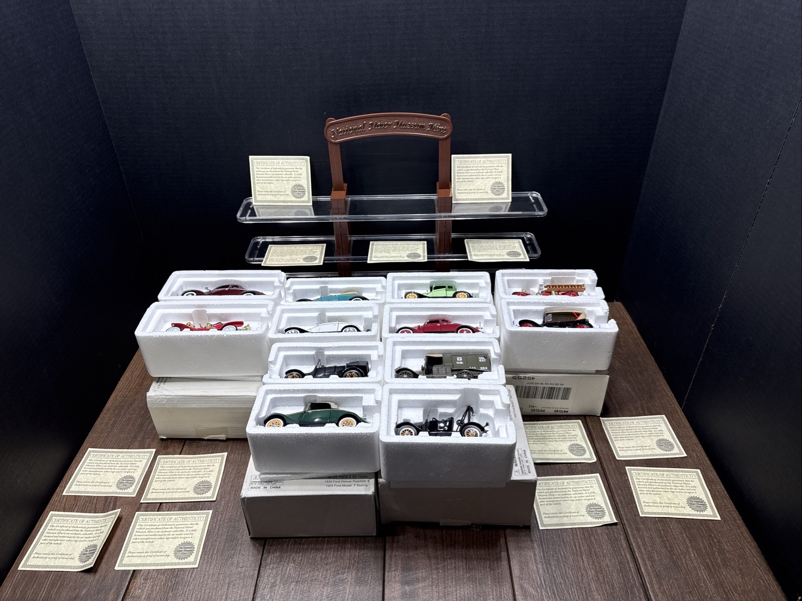 Lot Of 12 NATIONAL MOTOR MUSEUM MINT CARS WITH DISPLAY STAND