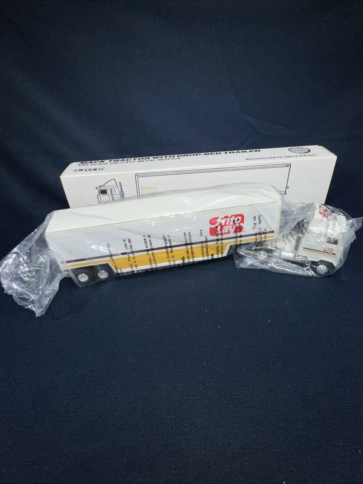 Ertl Frito Lay MACK Cabover Tractor with Drop Bed Trailer 1/64 Diecast NIB
