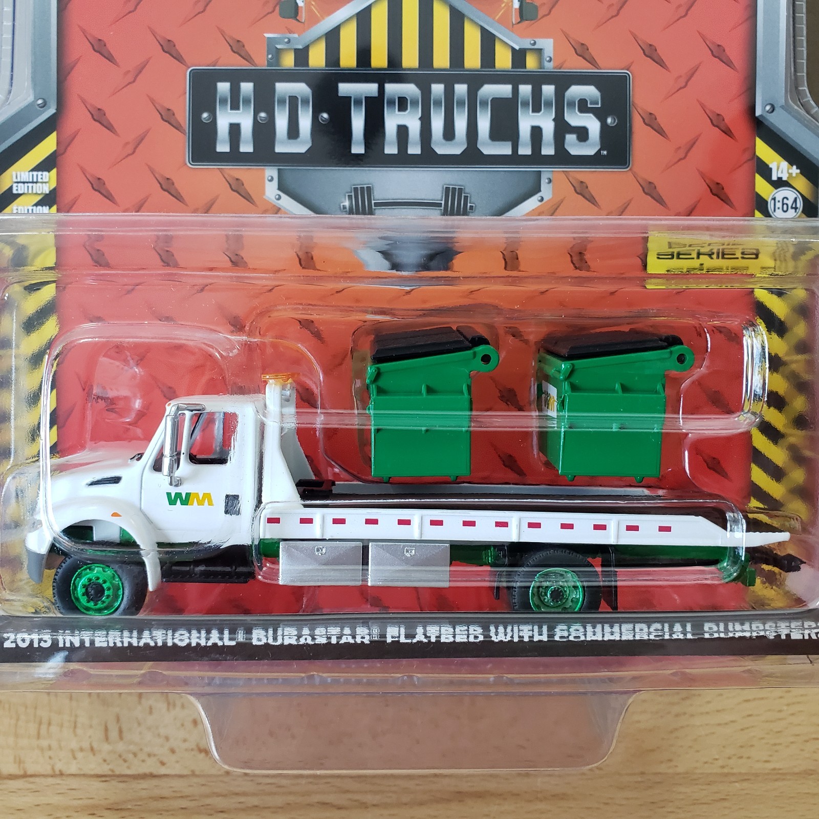 Greenlight 2013 International DuraStar Flatbed with Commercial Dumpsters 1:64