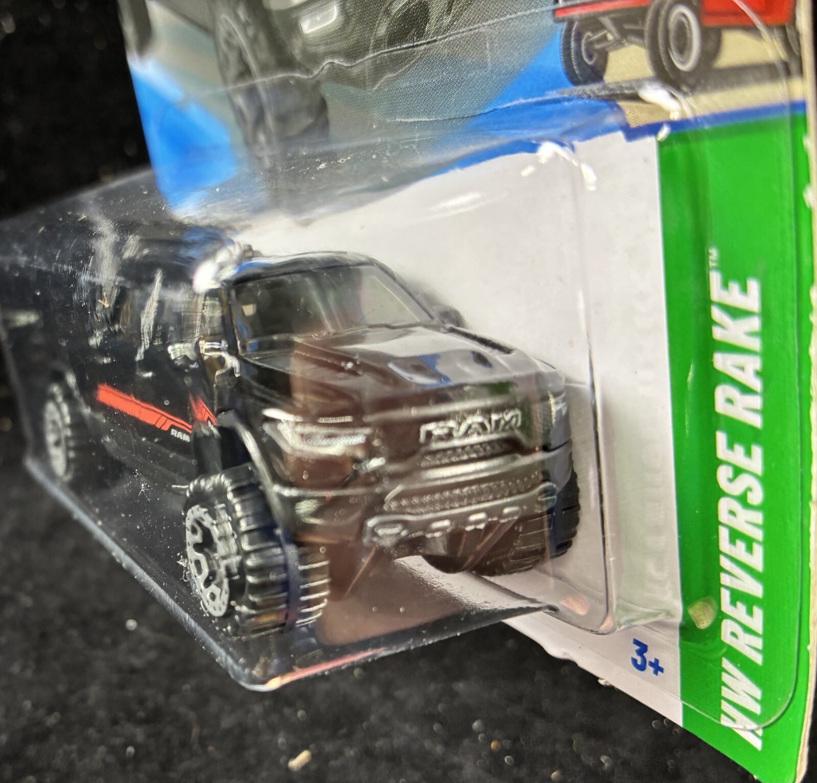 Hot Wheels Dodge ’23 Ram 1500 Black with Red Stripe, Licensed,6.2L Hemi V8