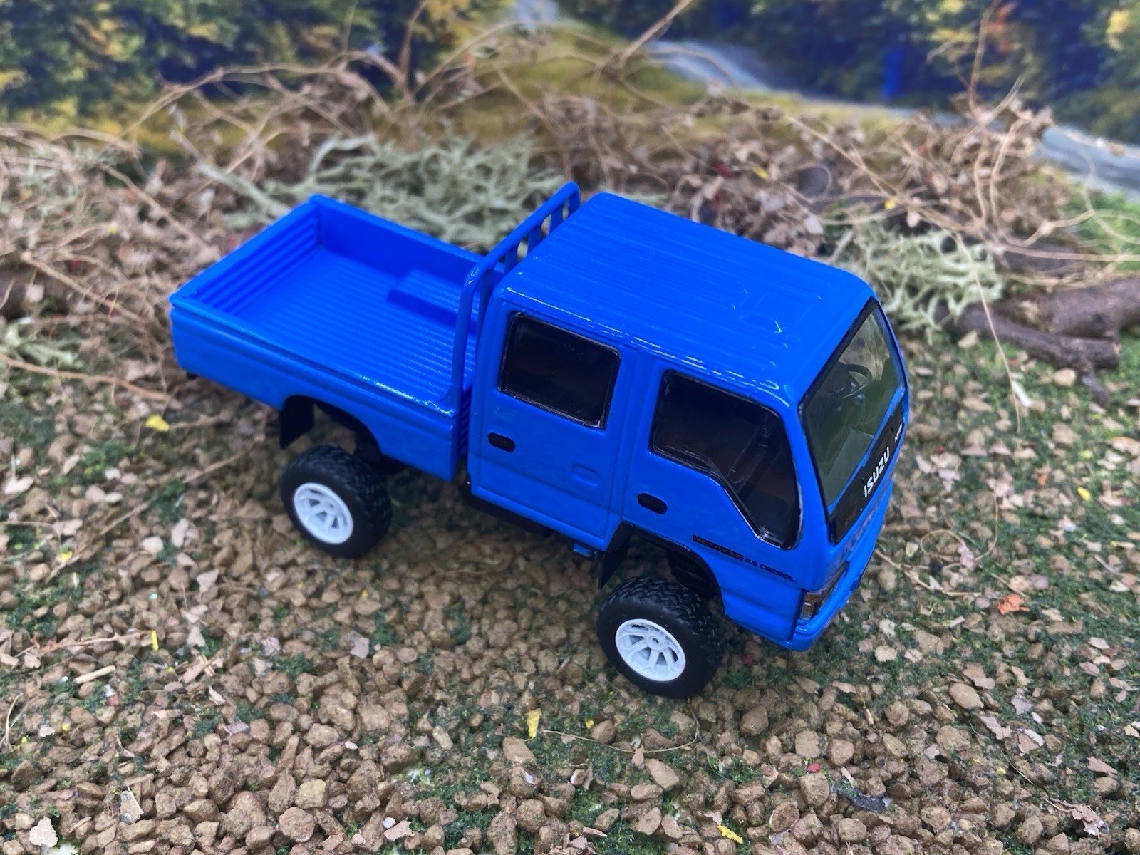 Isuzu NHR Lifted 4×4 Pickup Truck 1/64 Scale Massdi Diecast Custom Model1