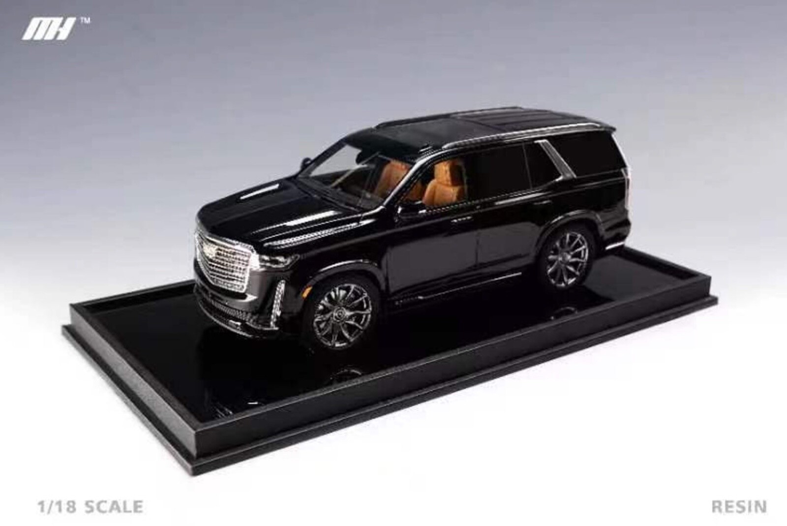 1/18 Motorhelix Cadillac Escalade 2022 in Gloss Black on Carbon Base