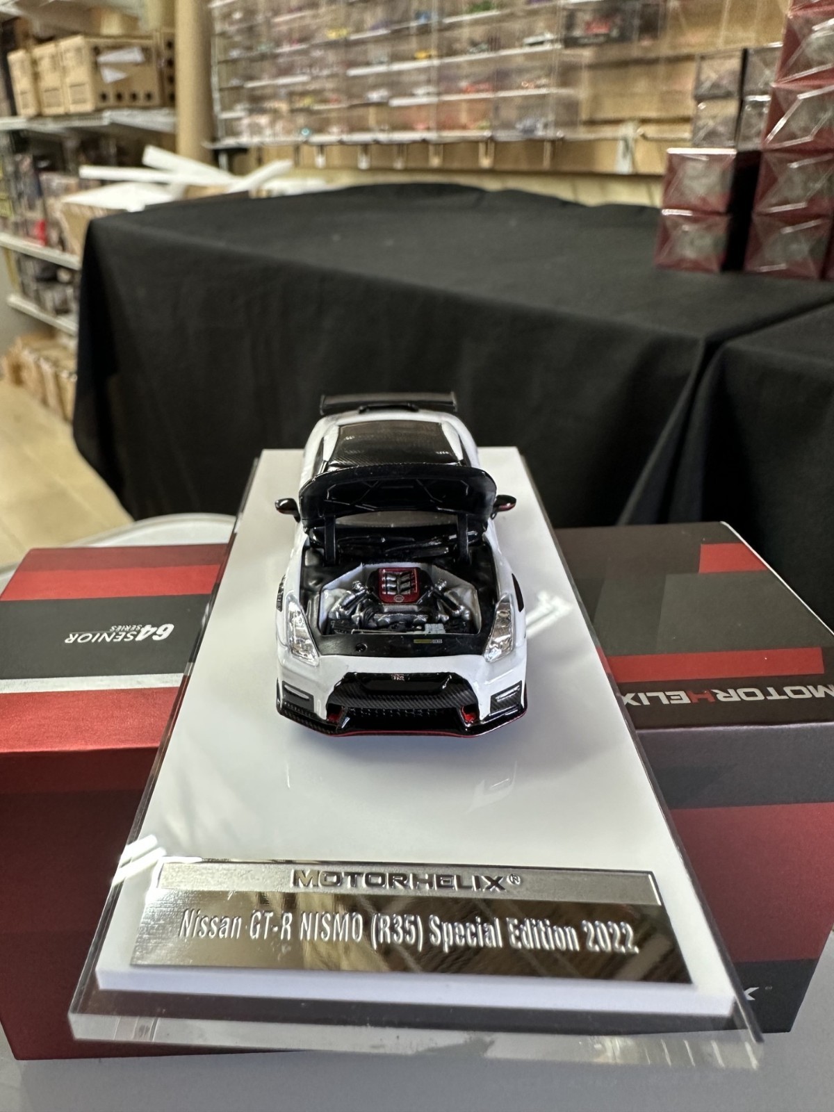 NISSAN SKYLINE GT-R R35 NISMO CARBON WHITE HOOD OPEN 1/64 CAR BY MOTORHELIX MH