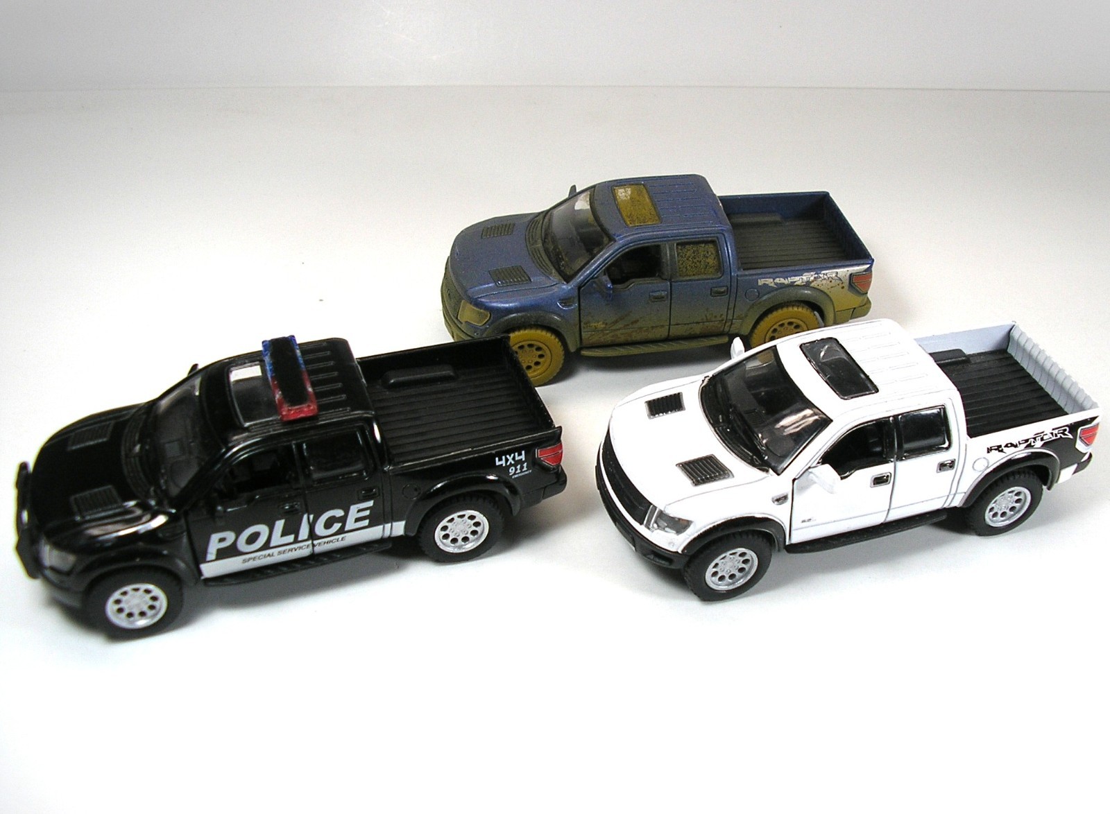 Lot of Kinsmart 2013 Ford F-150 SVT Raptor 1:46 diecast trucks Police & regular