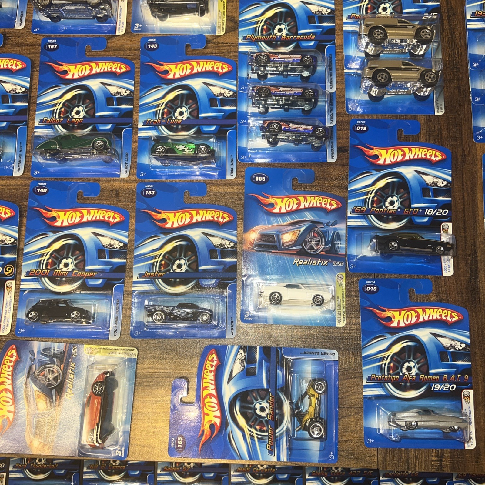 Lot of 71 Hot Wheels 2005 2006 Sealed Blue Cards First Editions Realistix