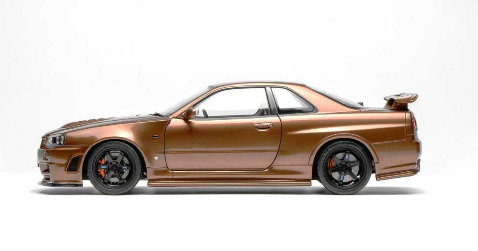 1/18 Motorhelix Nissan Skyline GT-R R34 in Metallic Bronze
