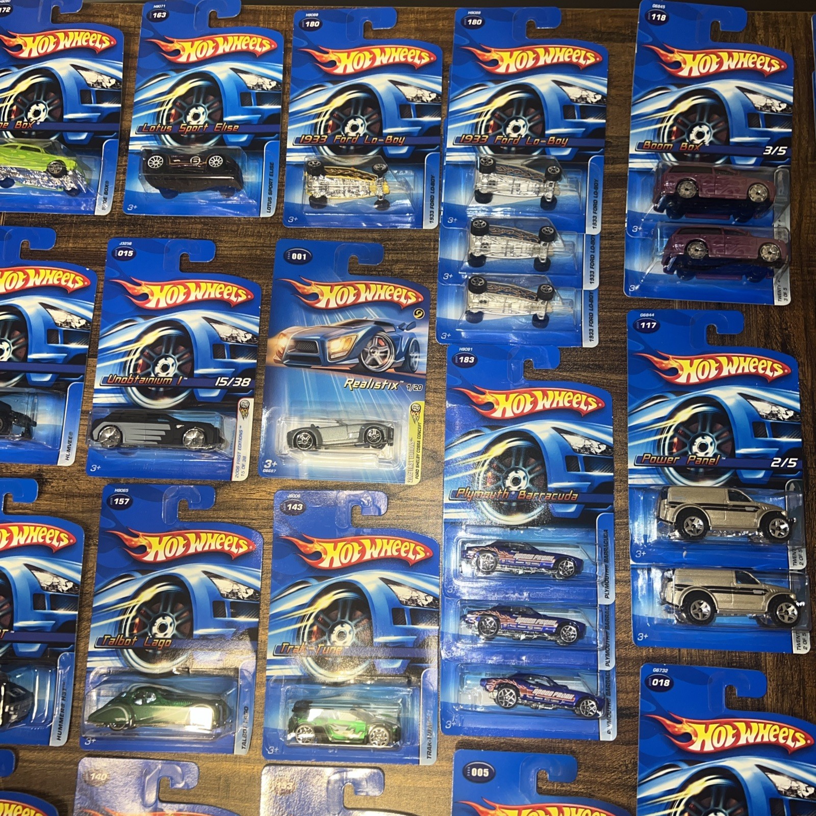 Lot of 71 Hot Wheels 2005 2006 Sealed Blue Cards First Editions Realistix