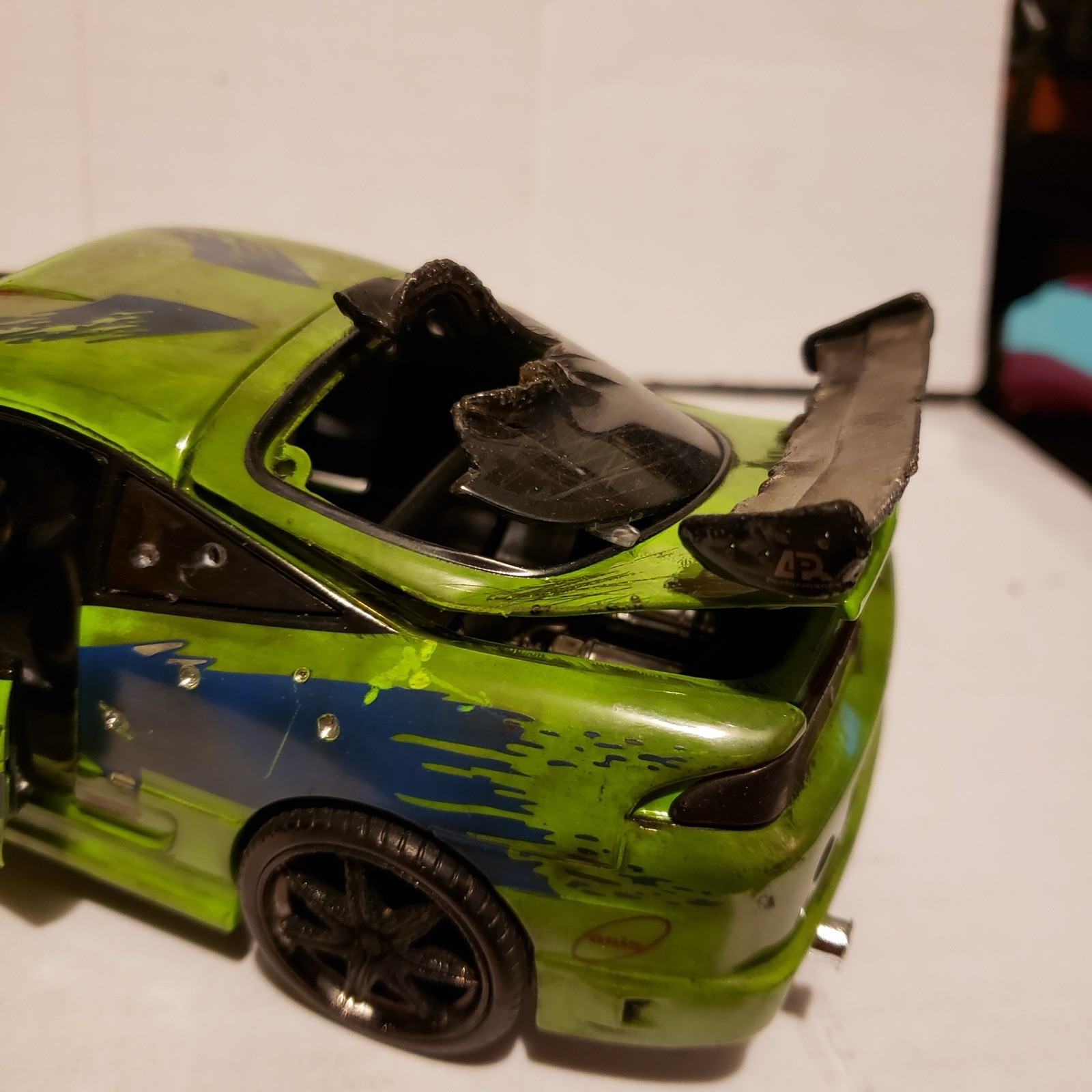 Jada Toys Tuned Diecast Model Car Green/Black/Blue w/ Large Rear Wing
