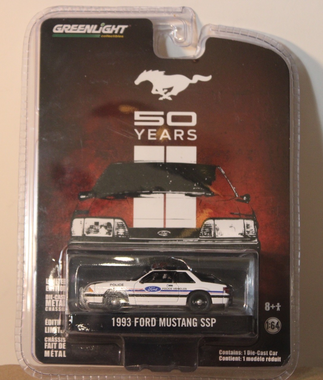 GreenLight Pursuit 50 Years 1993 Ford Mustang SSP Police Foxbody White 1:64