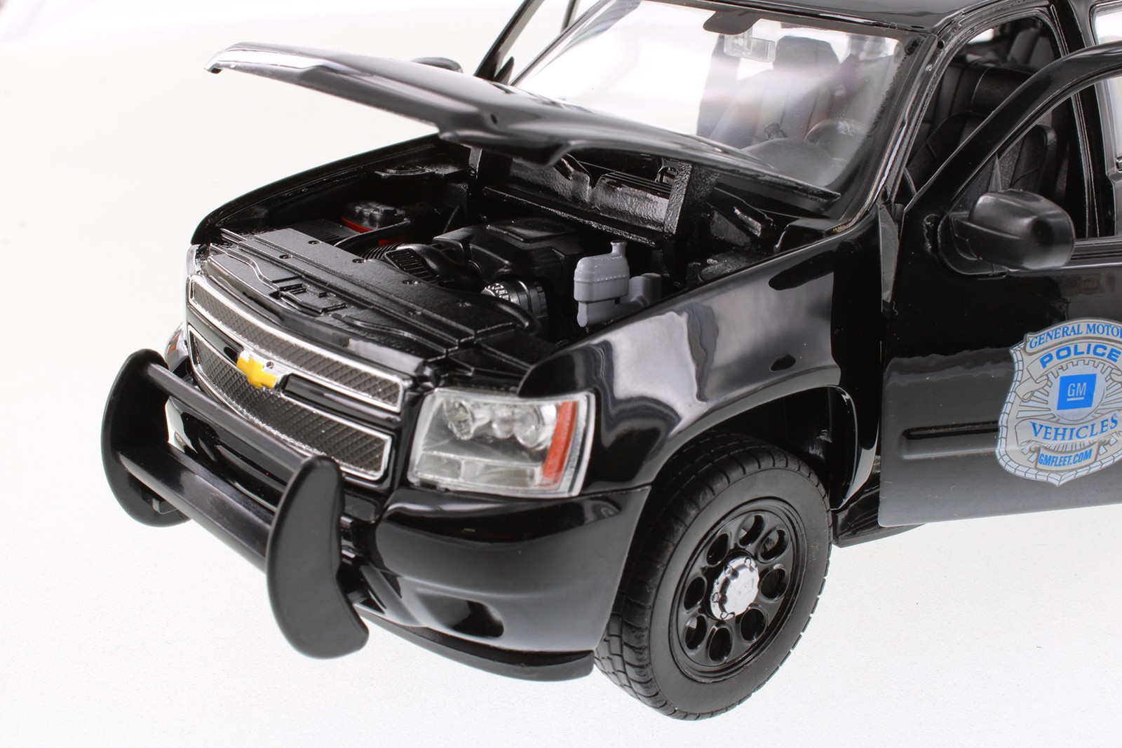 BOX OF 4 2008 CHEVY TAHOE GENERAL MOTORS POLICE 1/24 DIECAST CAR 22509BP/4D