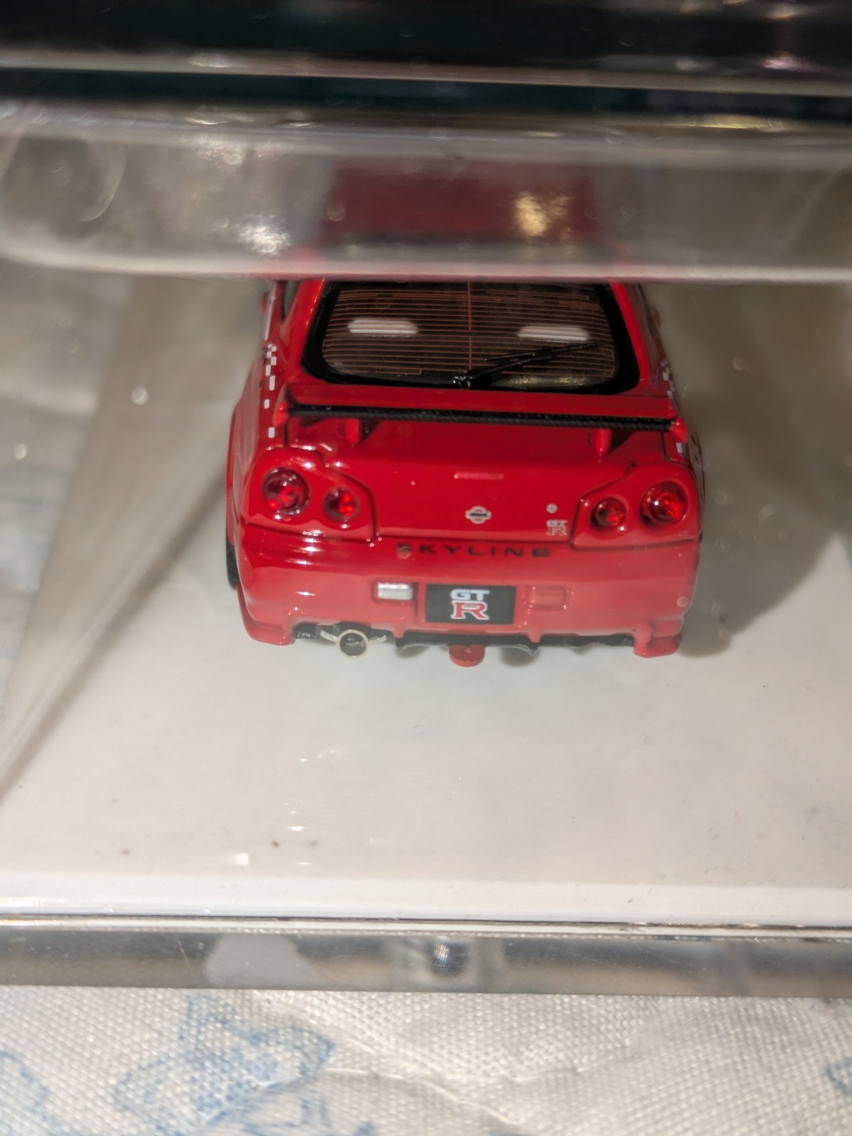 Motorhelix Nissan R34 Red 1;64 Diecast