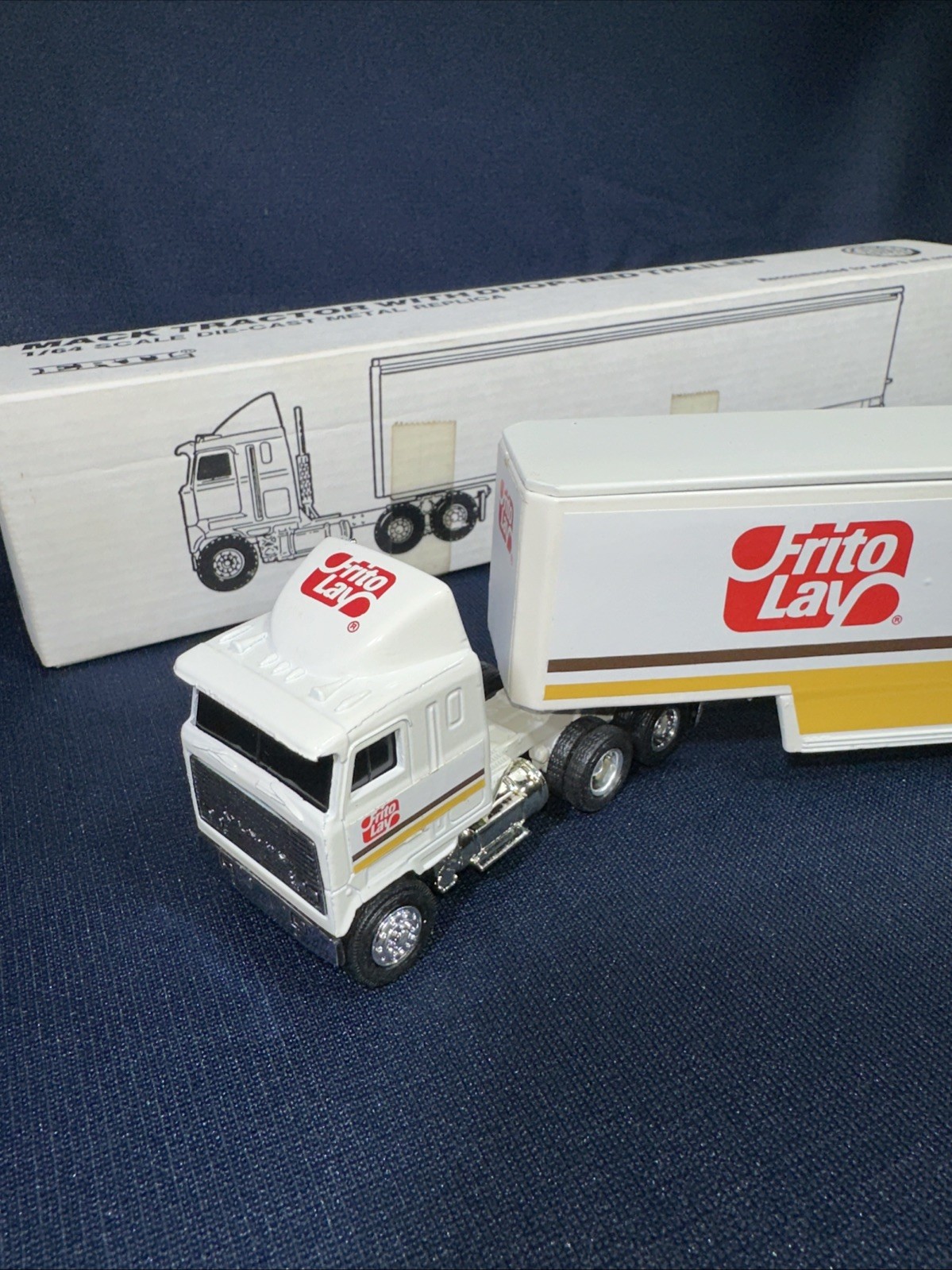 Ertl Frito Lay MACK Cabover Tractor with Drop Bed Trailer 1/64 Diecast NIB