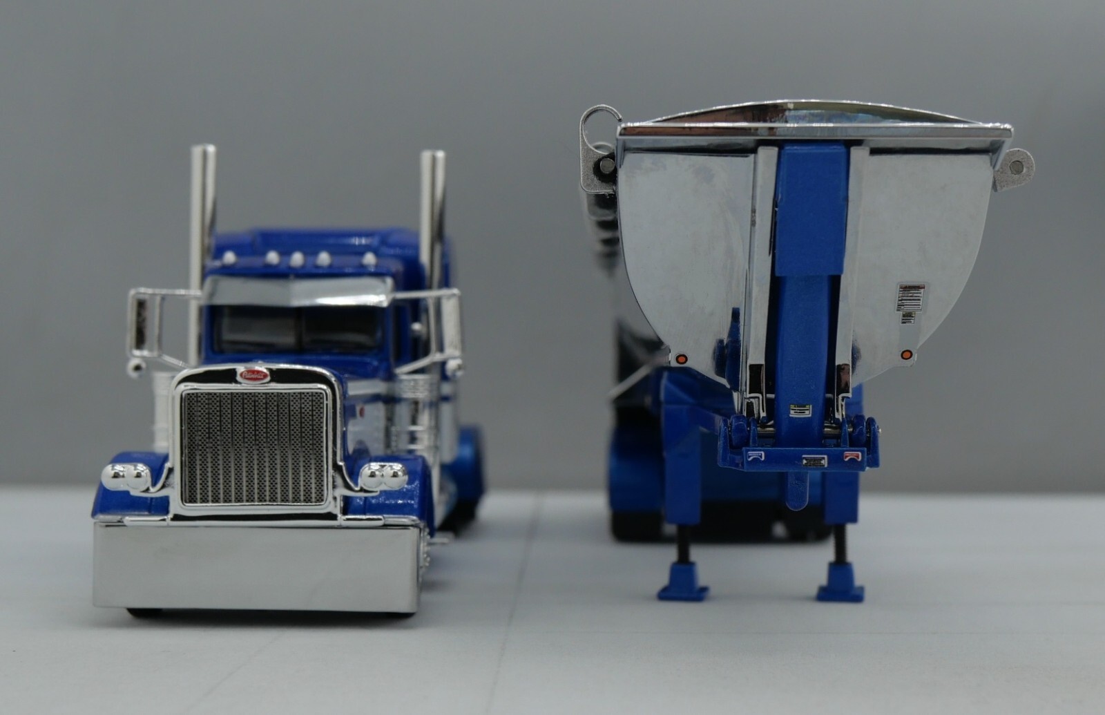 DCP 1/64 Blue White Peterbilt 389 Mac Spread Axle Round Dump Trailer 60-1740