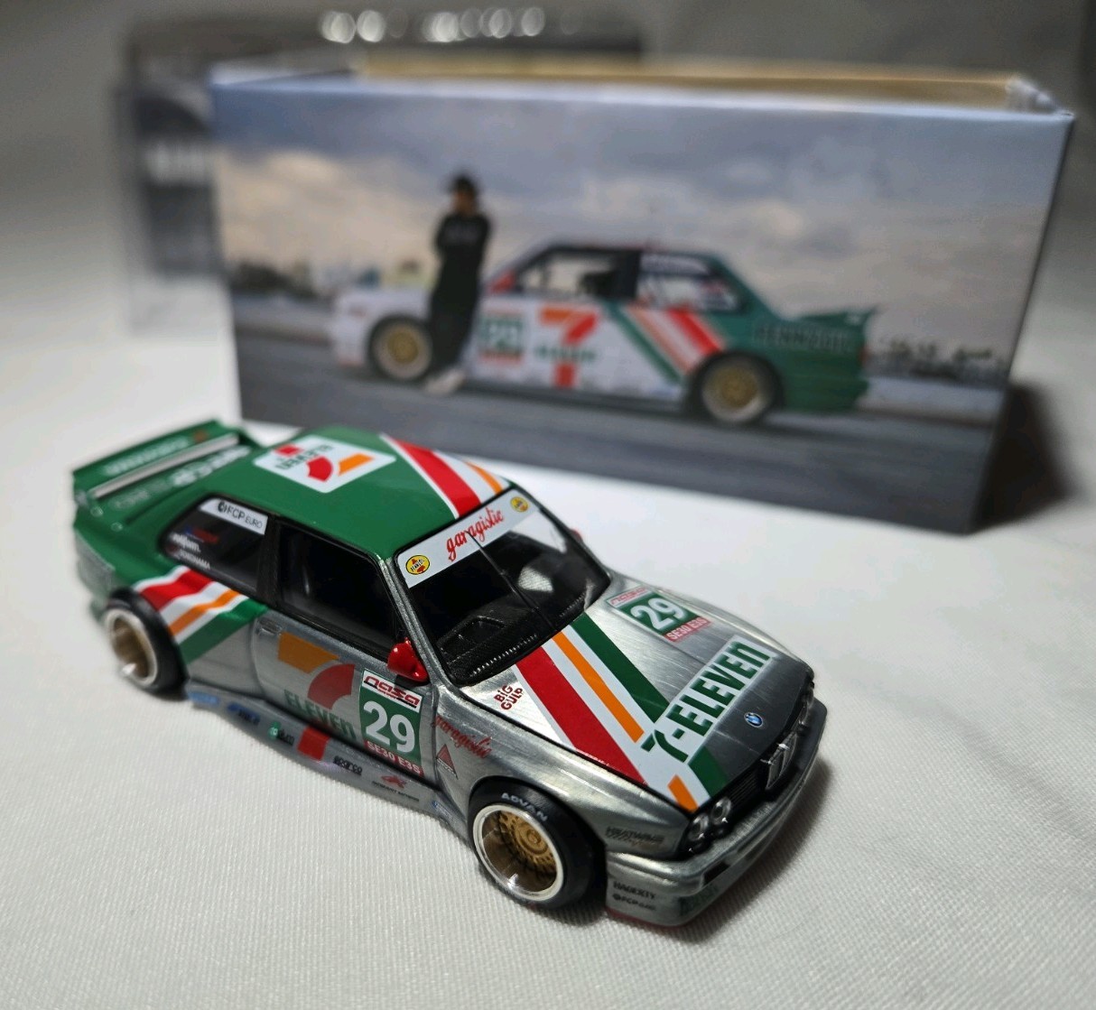 Kaido House x Mini GT 1:64 CHASE BMW M3 Larry Chen 7-Eleven