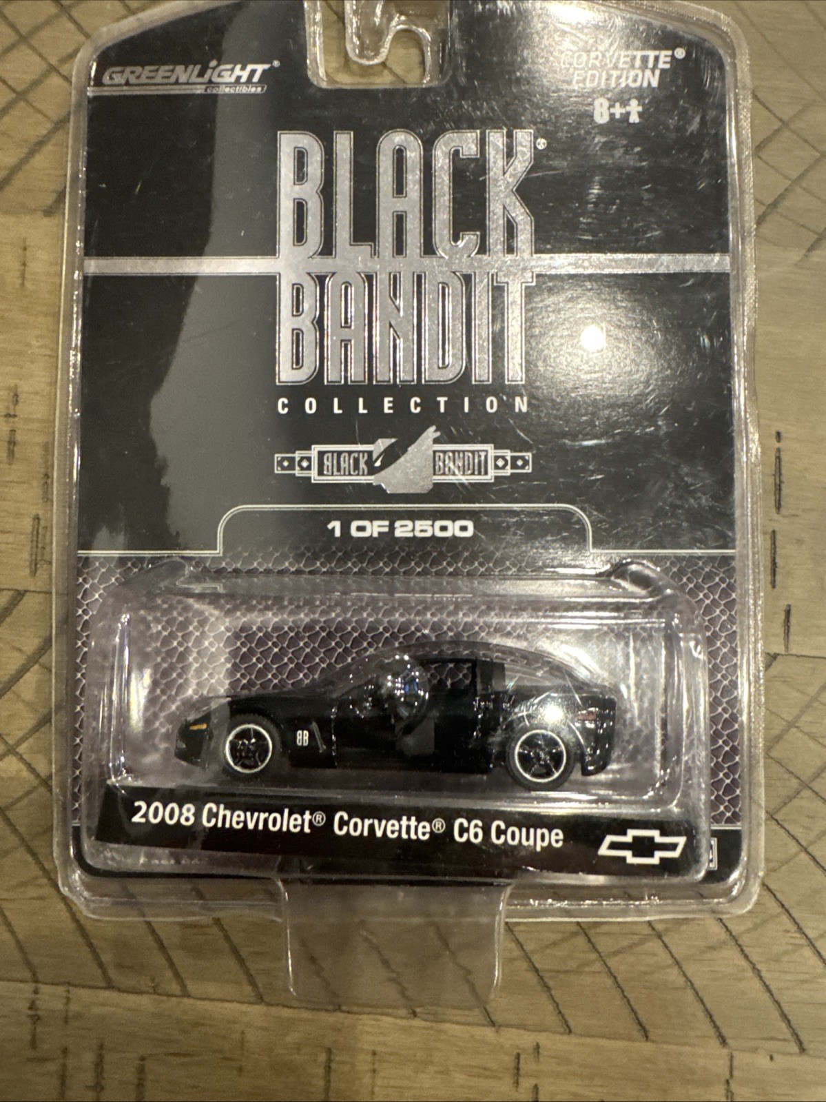 Greenlight Black Bandit Collection 2008 Chevrolet Corvette C6 Coupe a 1:64 scale
