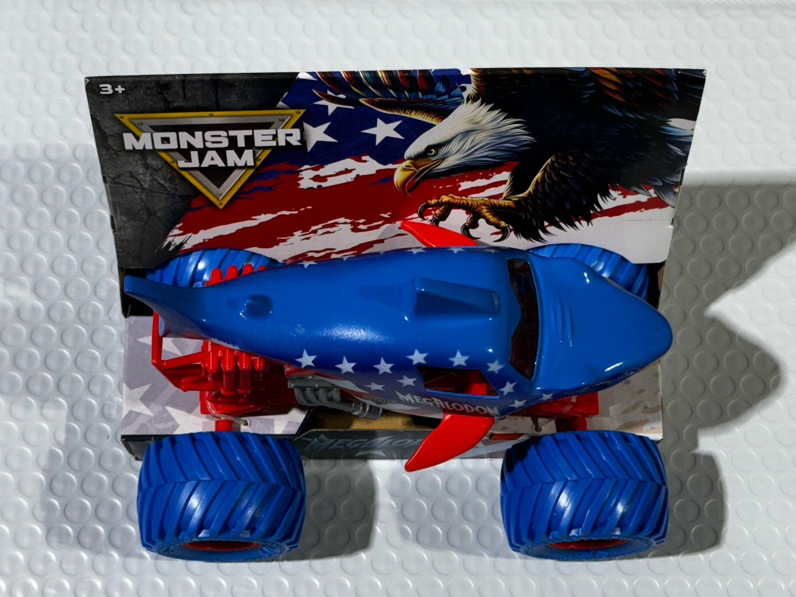 Monster Jam 2026 Stars & Stripes MEGALODON 1:24 BIG