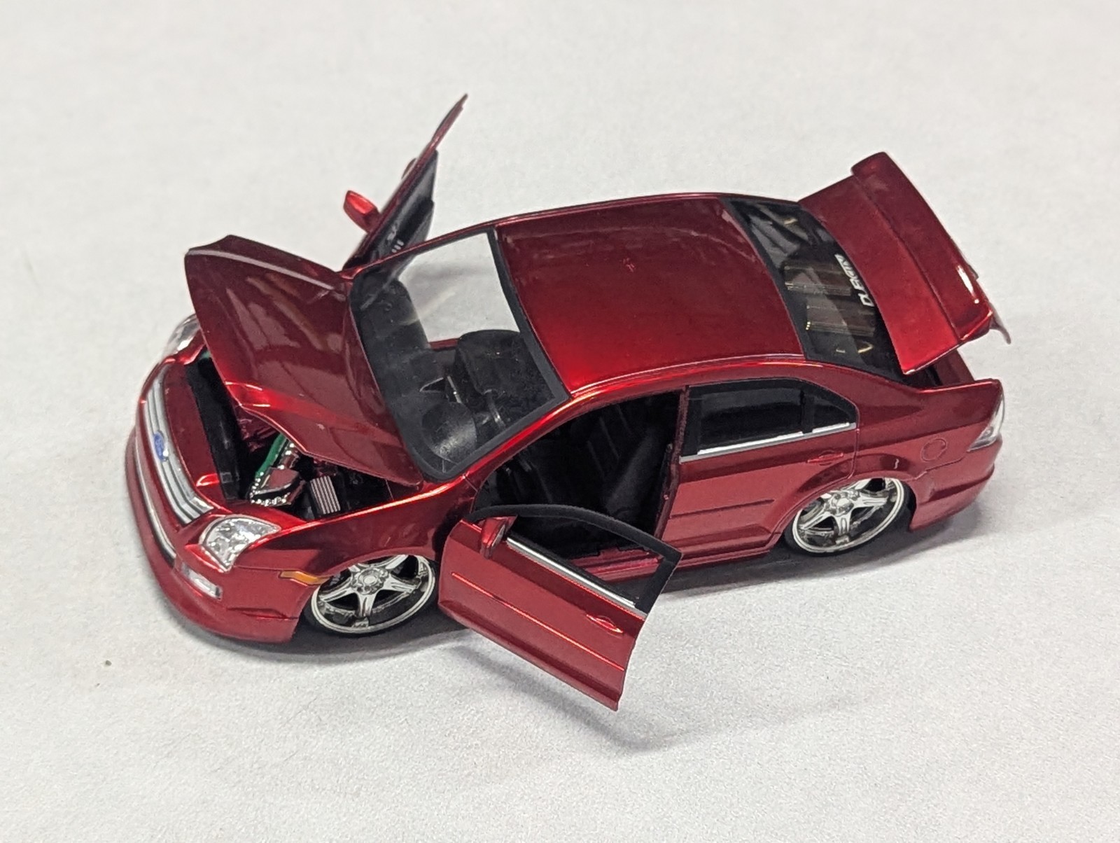 JADA DUB CITY 2006 FORD FUSION BLUE & RED 1:24 DIECAST MODEL USED Scuffs NO BOX