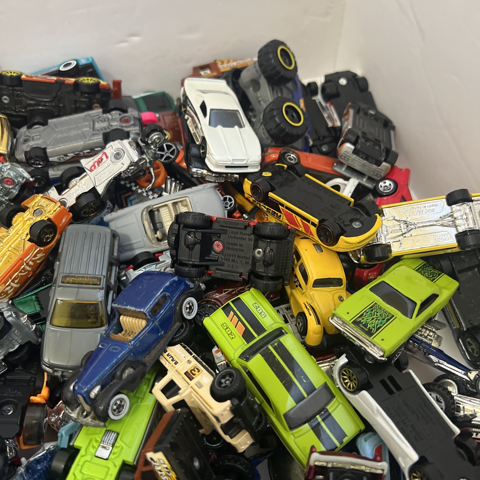 30 LBS Pounds of pure hotwheels. There are many different years and castings.