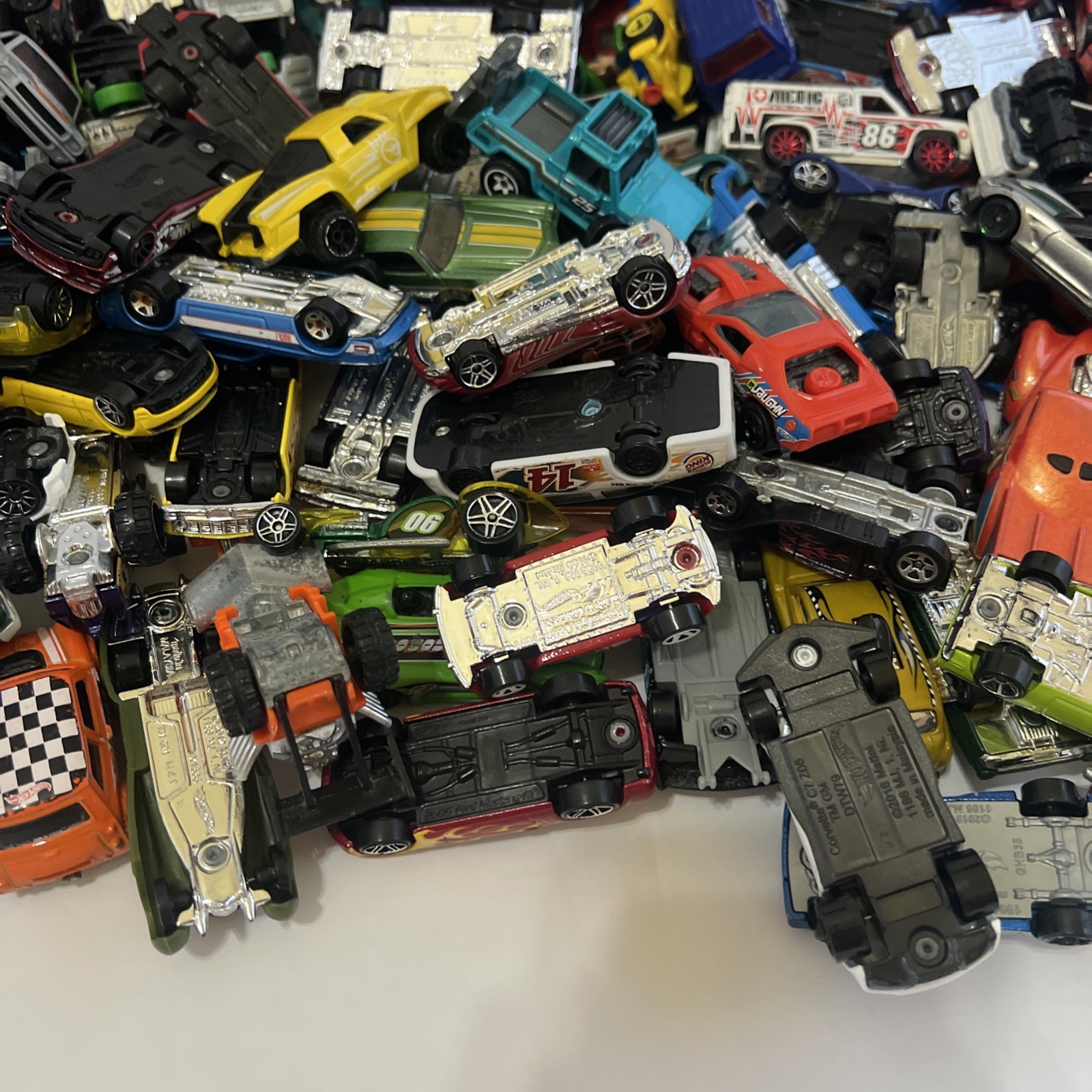 30 LBS Pounds of pure hotwheels. There are many different years and castings.