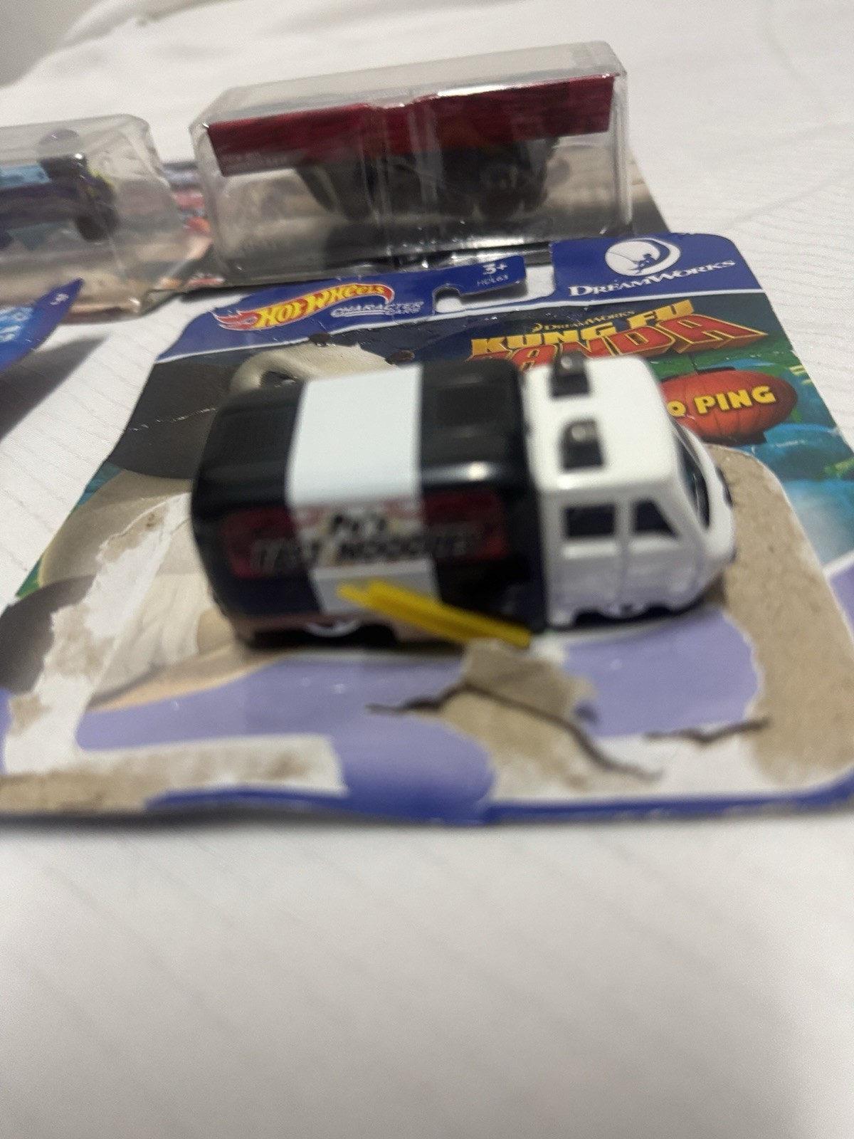 hot wheels mix lot of 4- see photos please-damaged package-new never used