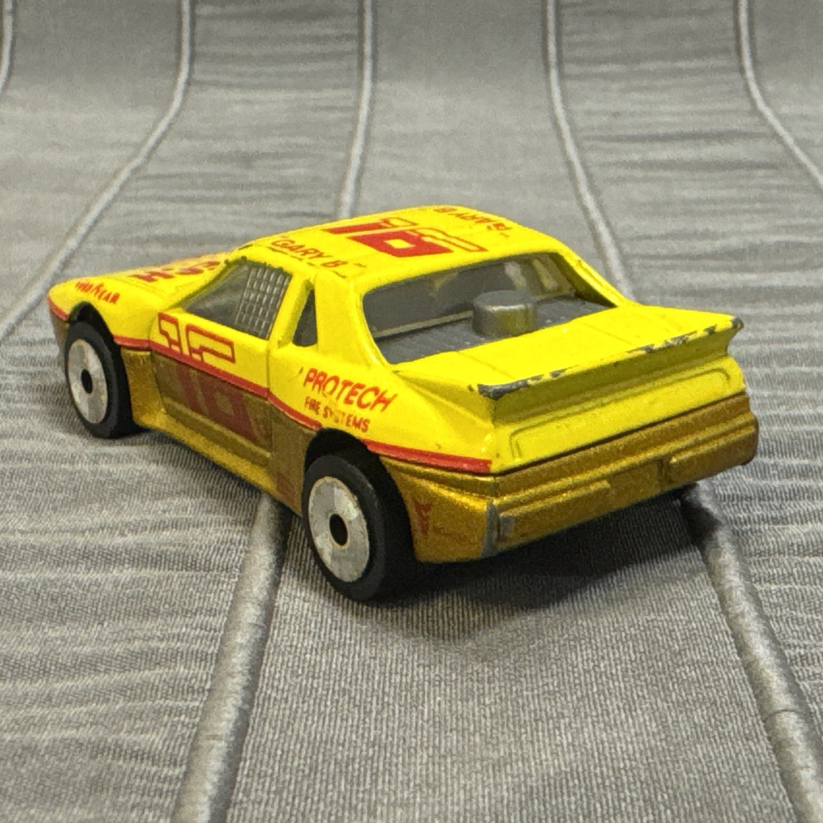 Matchbox Pontiac Fiero, Yellow, #16 Protech Fire Systems