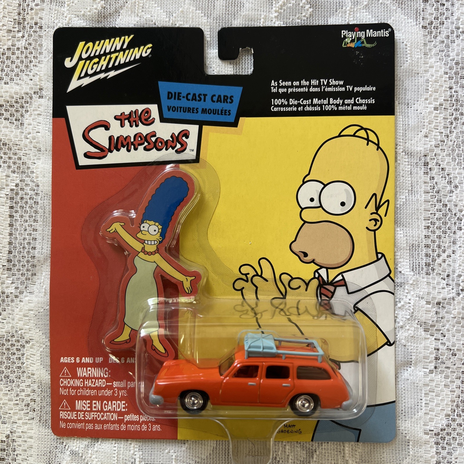 Johnny Lightning The Simpsons Marge’s Car 1:64 Diecast Orange Unopened Box