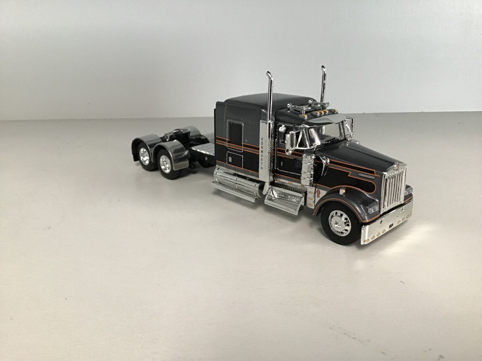 NEW DCP SILVER & BLACK KENWORTH W900L 72″ W/ 310” FRAME SS REAR FENDERS