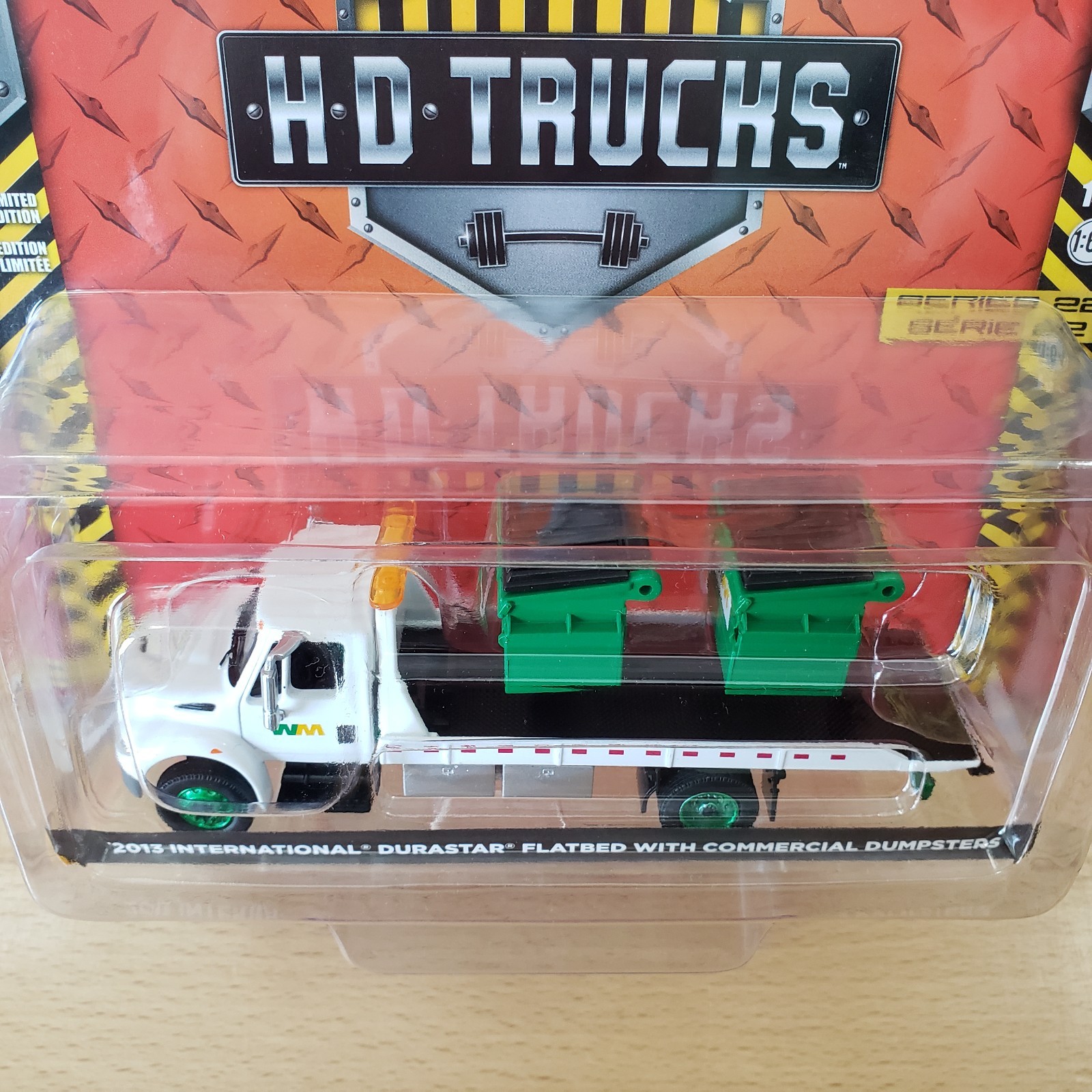Greenlight 2013 International DuraStar Flatbed with Commercial Dumpsters 1:64
