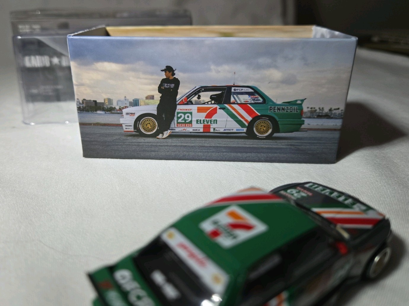 Kaido House x Mini GT 1:64 CHASE BMW M3 Larry Chen 7-Eleven