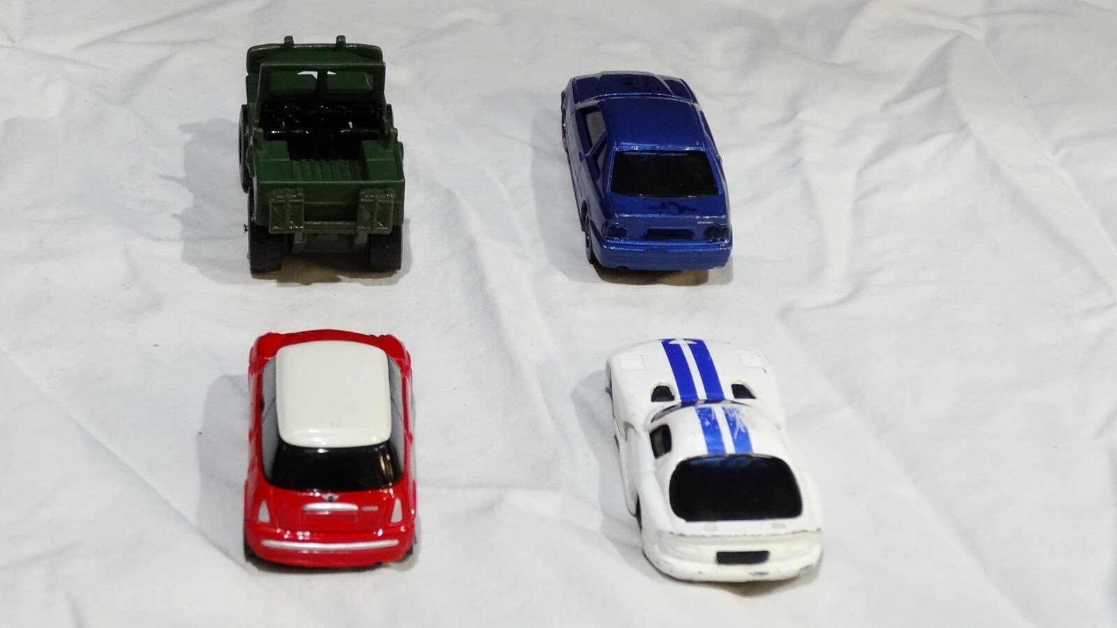 4 Diecast Maisto lot. In fair condition, Please see photos 