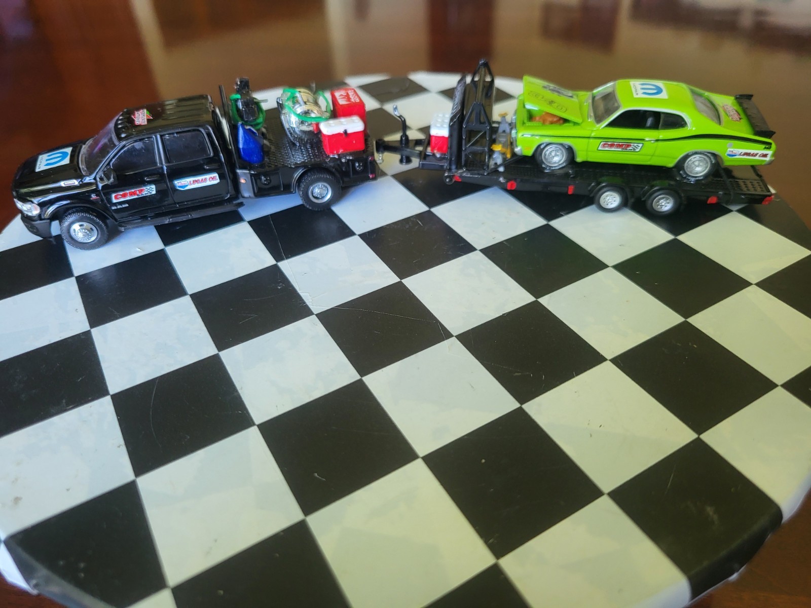 1:64 Greenlight Dually Drivers 2023 RAM 3500 Dually Flatbed & 71 Plym Duster 340