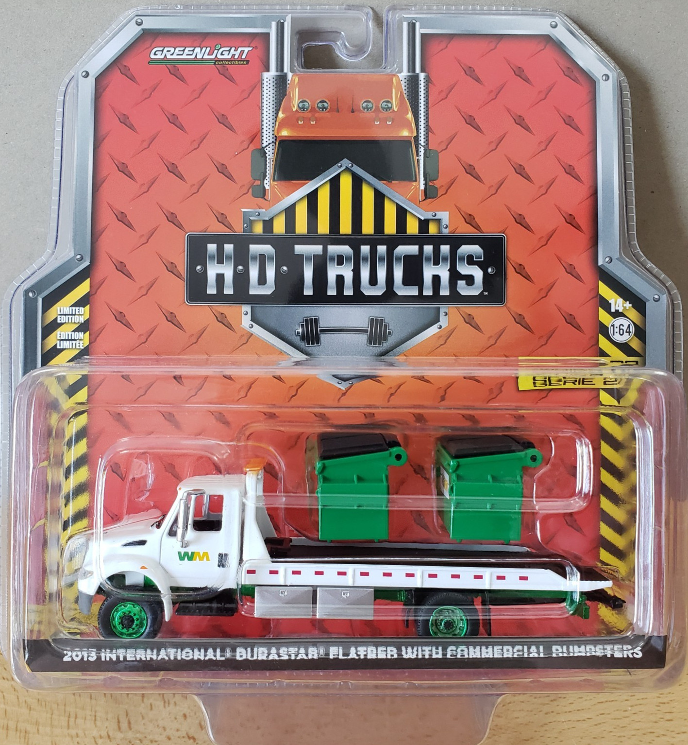 Greenlight 2013 International DuraStar Flatbed with Commercial Dumpsters 1:64