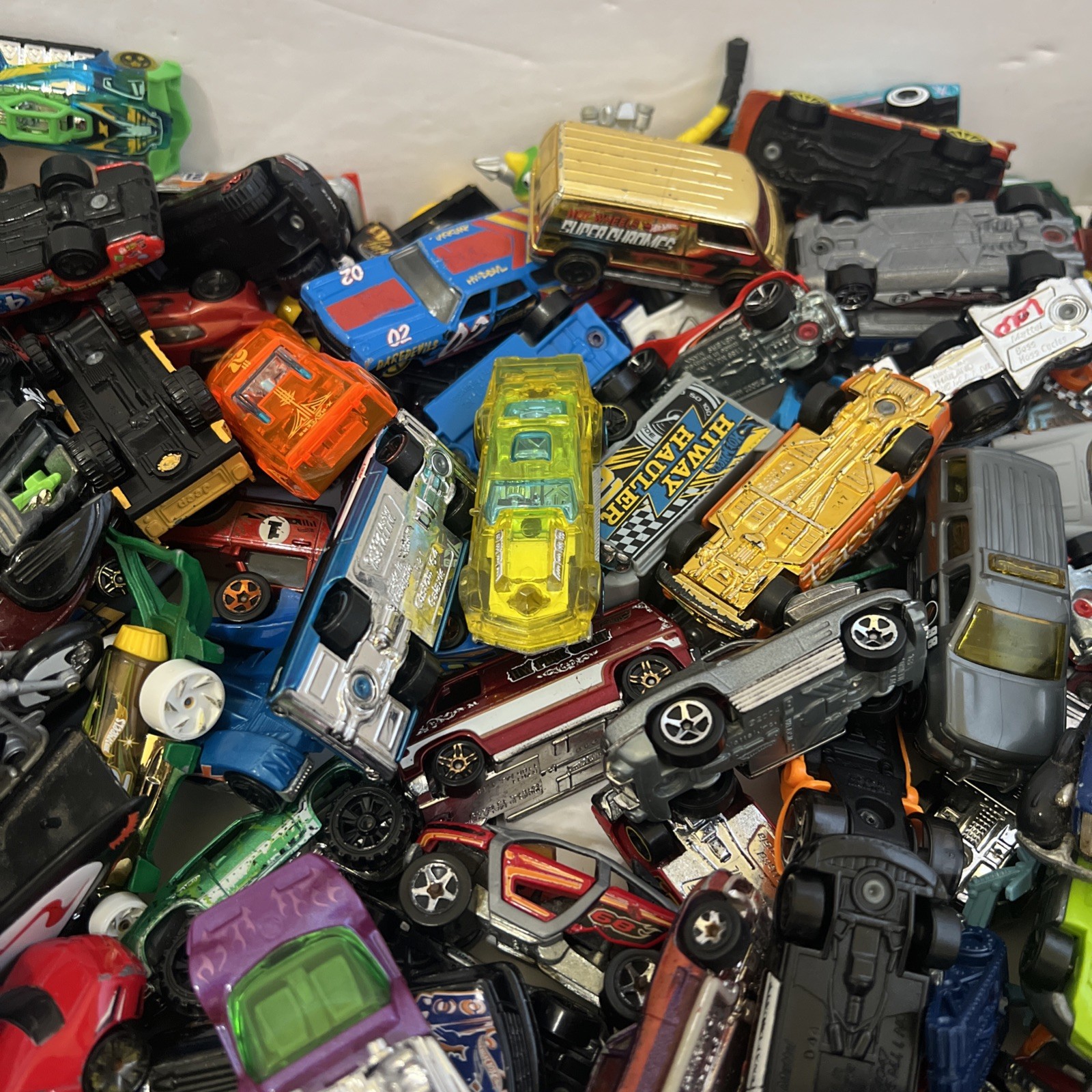 30 LBS Pounds of pure hotwheels. There are many different years and castings.