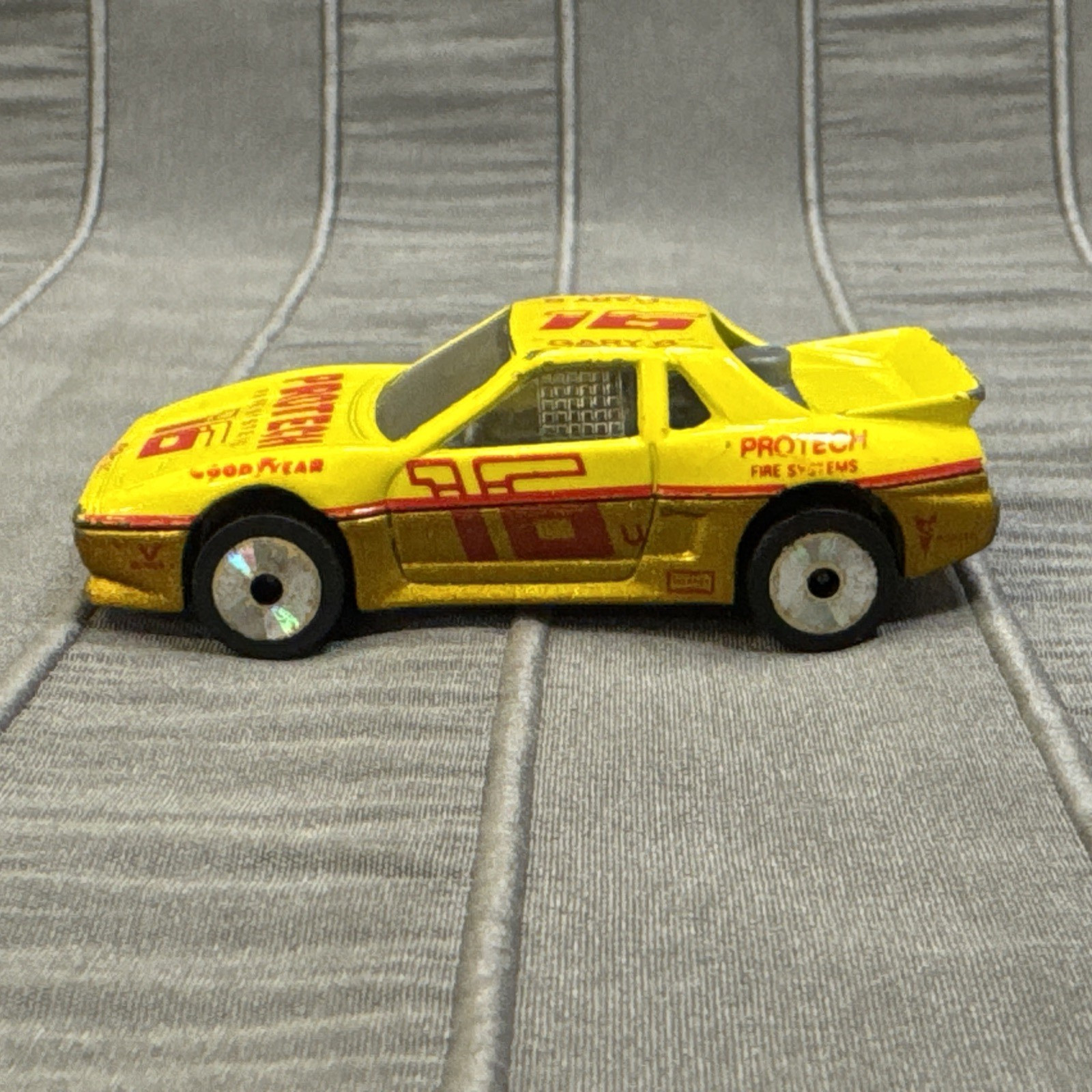 Matchbox Pontiac Fiero, Yellow, #16 Protech Fire Systems