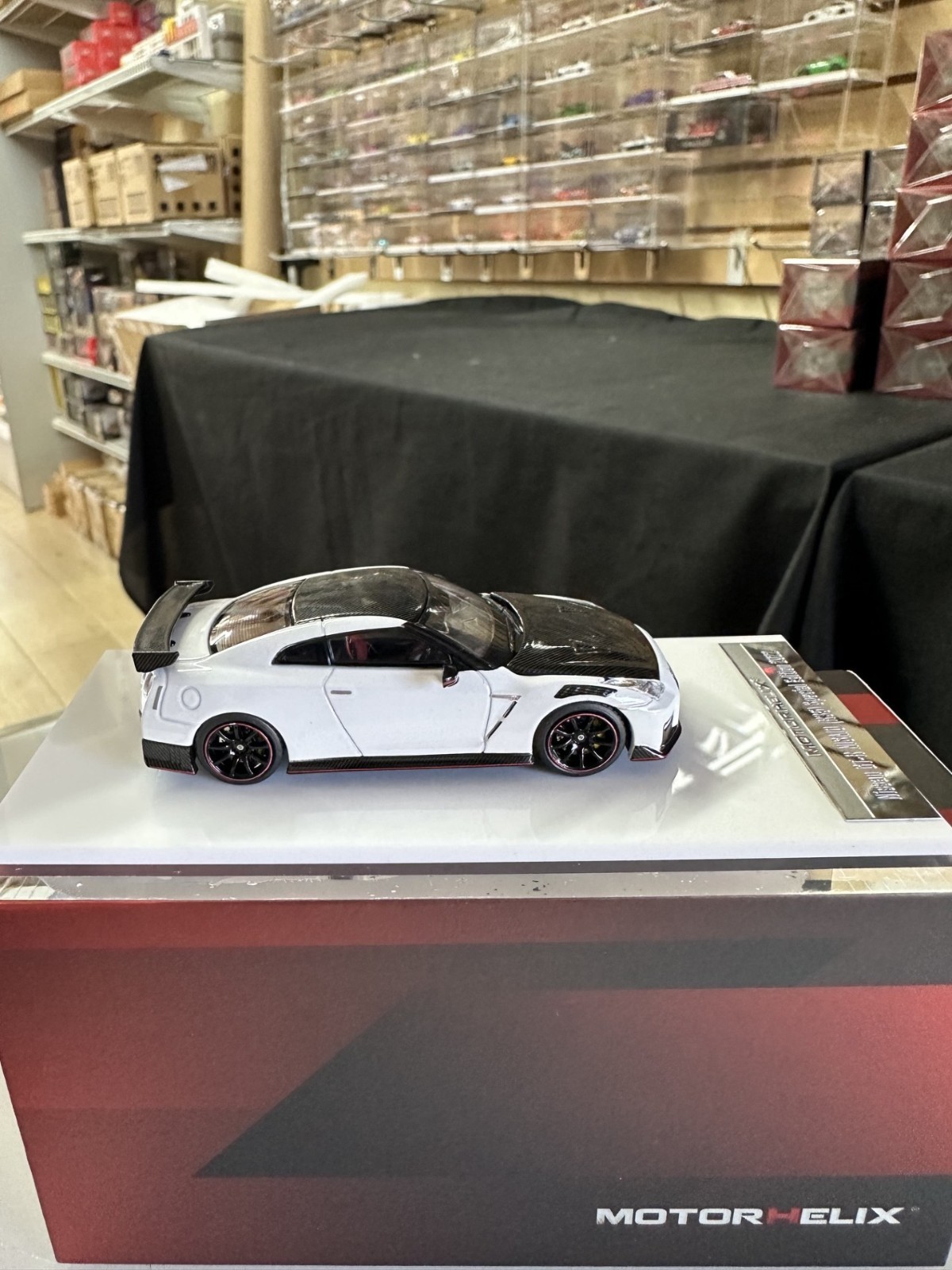 NISSAN SKYLINE GT-R R35 NISMO CARBON WHITE HOOD OPEN 1/64 CAR BY MOTORHELIX MH