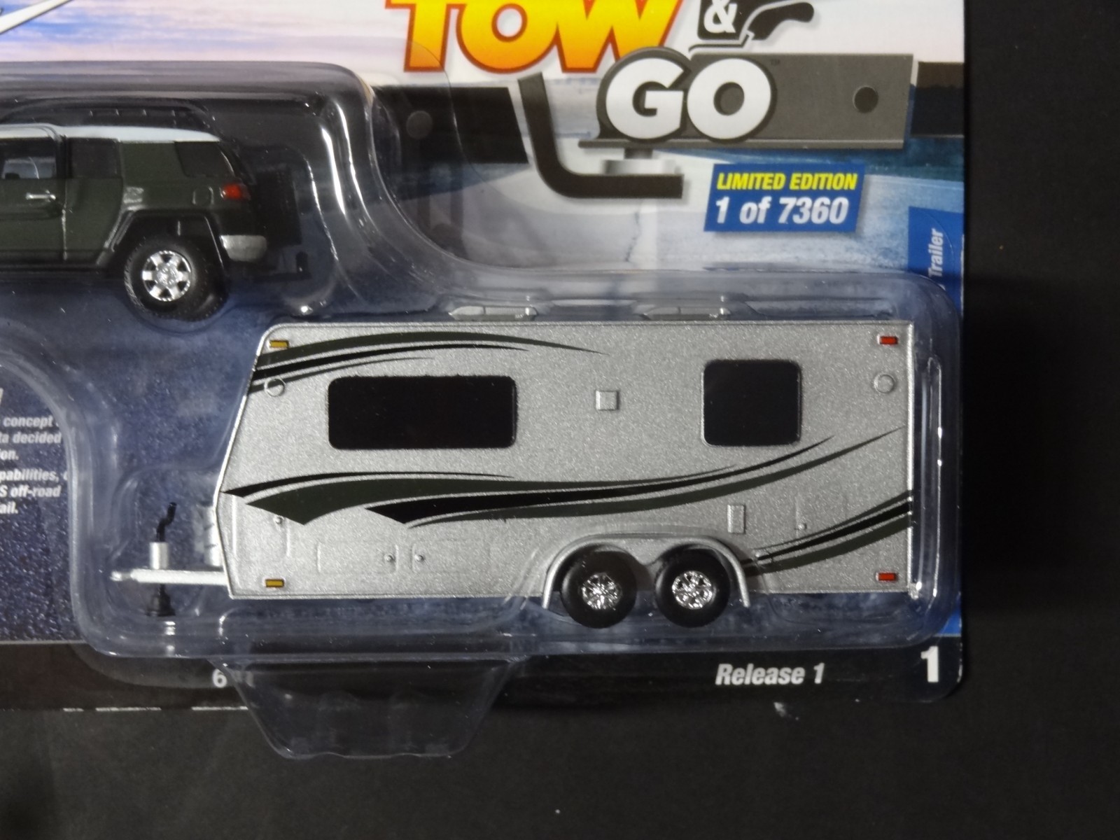 JOHNNY LIGHTNING – GREEN – 2010 TOYOTA FJ CRUISER WITH CAMPER TRAILER