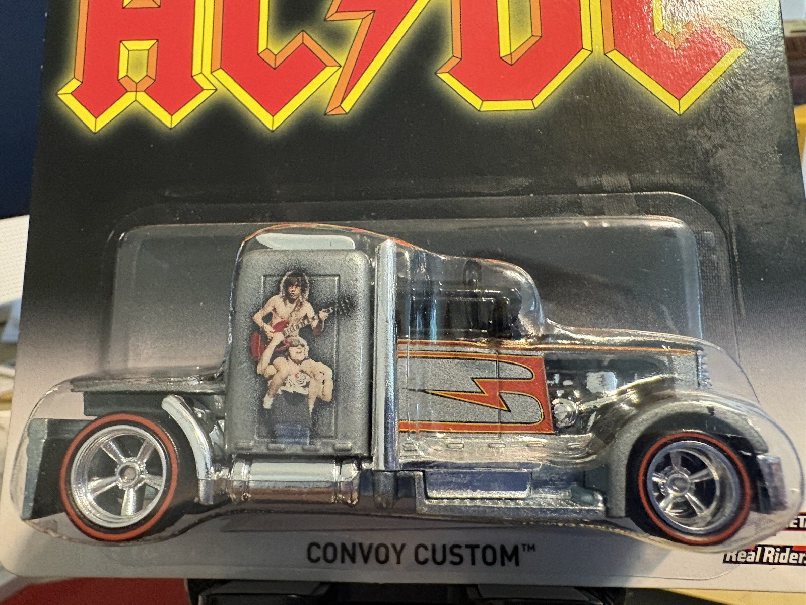 Hot Wheels Premium Pop Culture AC/DC Convoy Custom Ships In A Protector