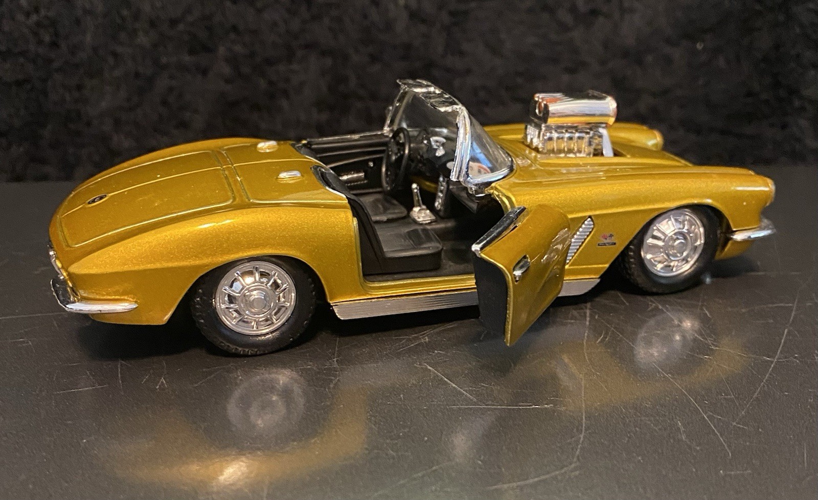 1962 Gold Chevrolet Corvette Convertible 1/32 Scale. SS 5750. Pullback action.