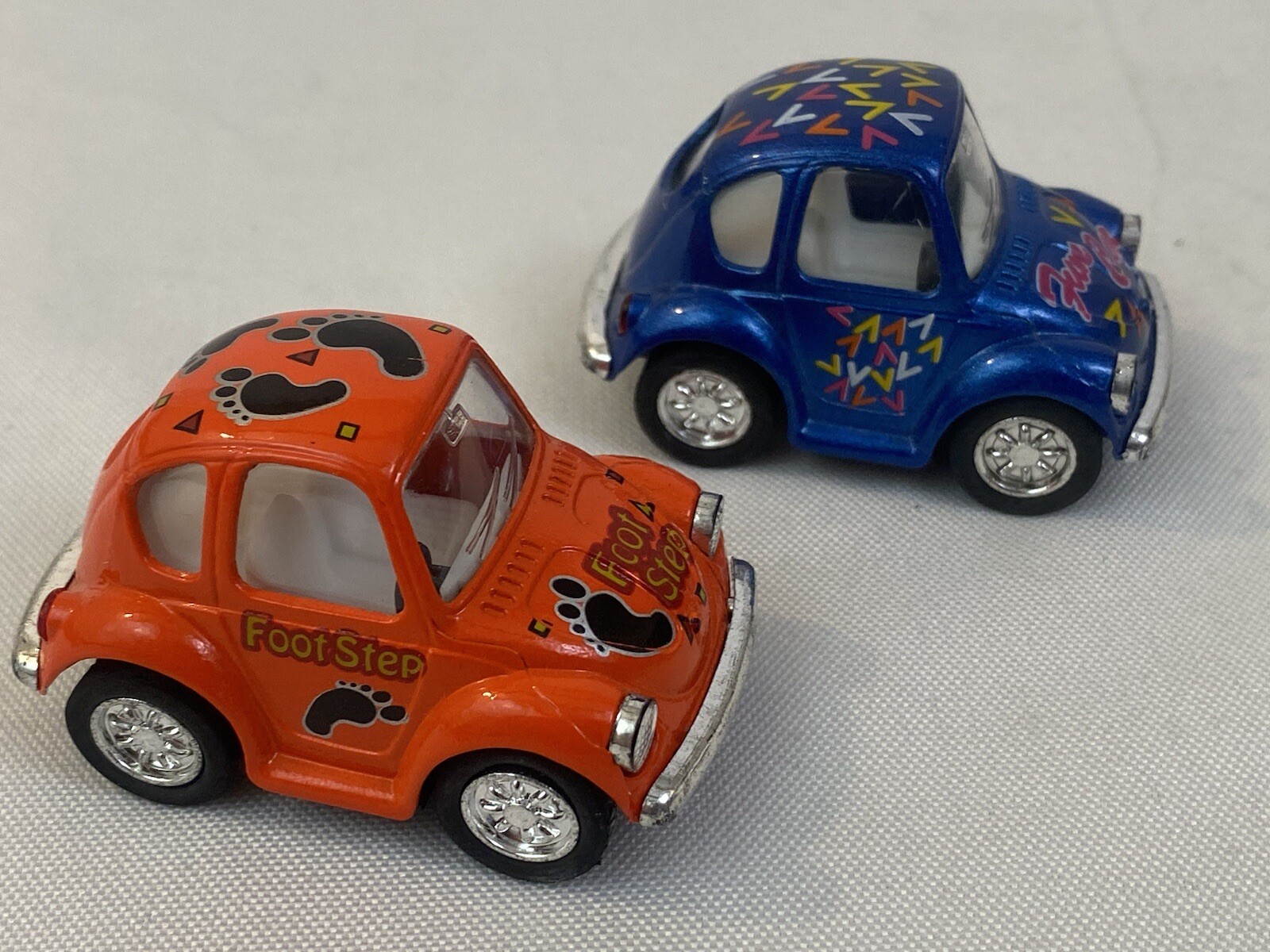 Pair Of Kintoy Pullback Volkswagen Beetles Blue Orange Foot Step Fun Car