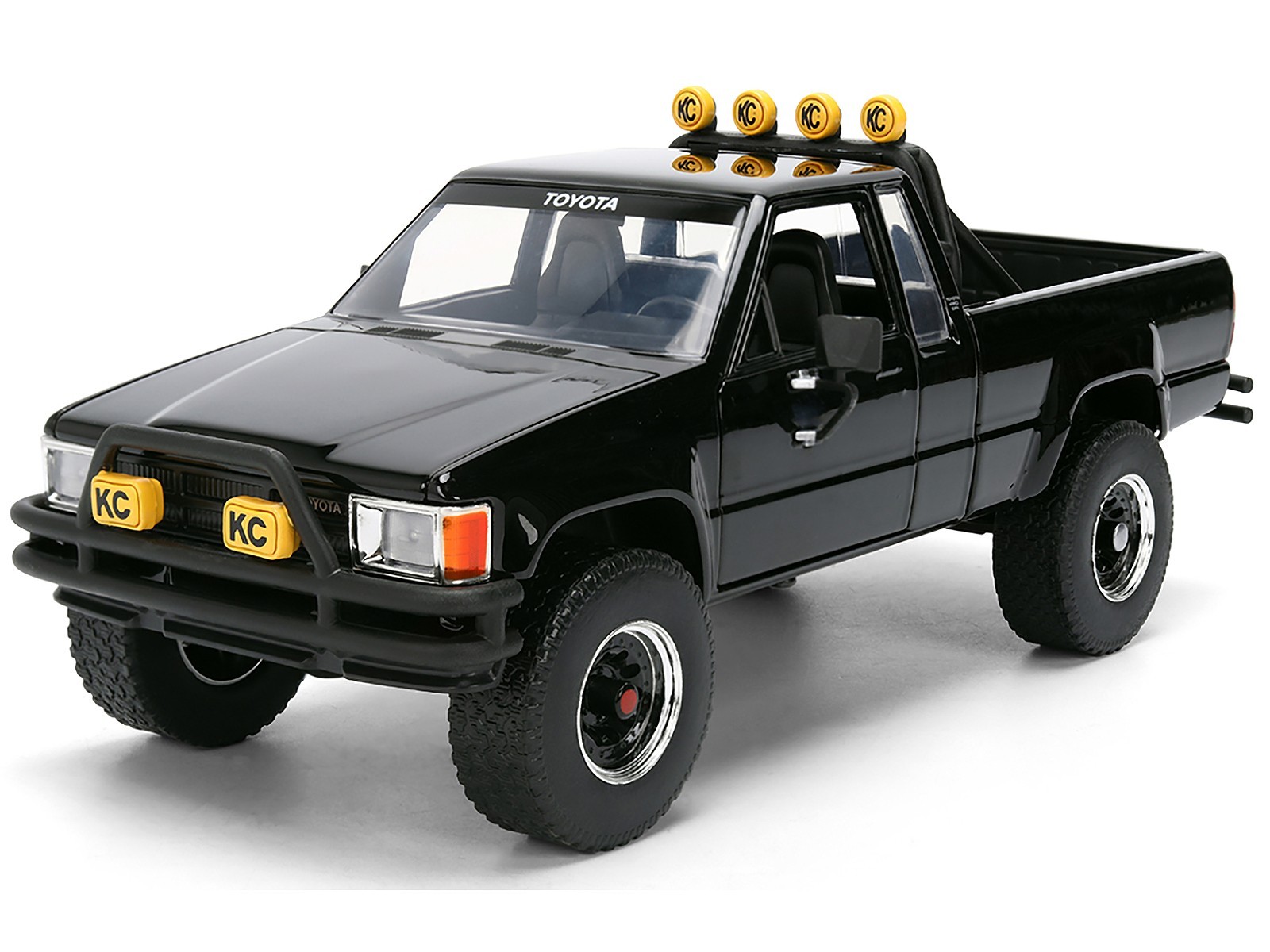 1985 TOYOTA SR5 PICKUP BLACK W/SKATEBOARD “BACK TO THE FUTURE” 1/24 JADA 36479
