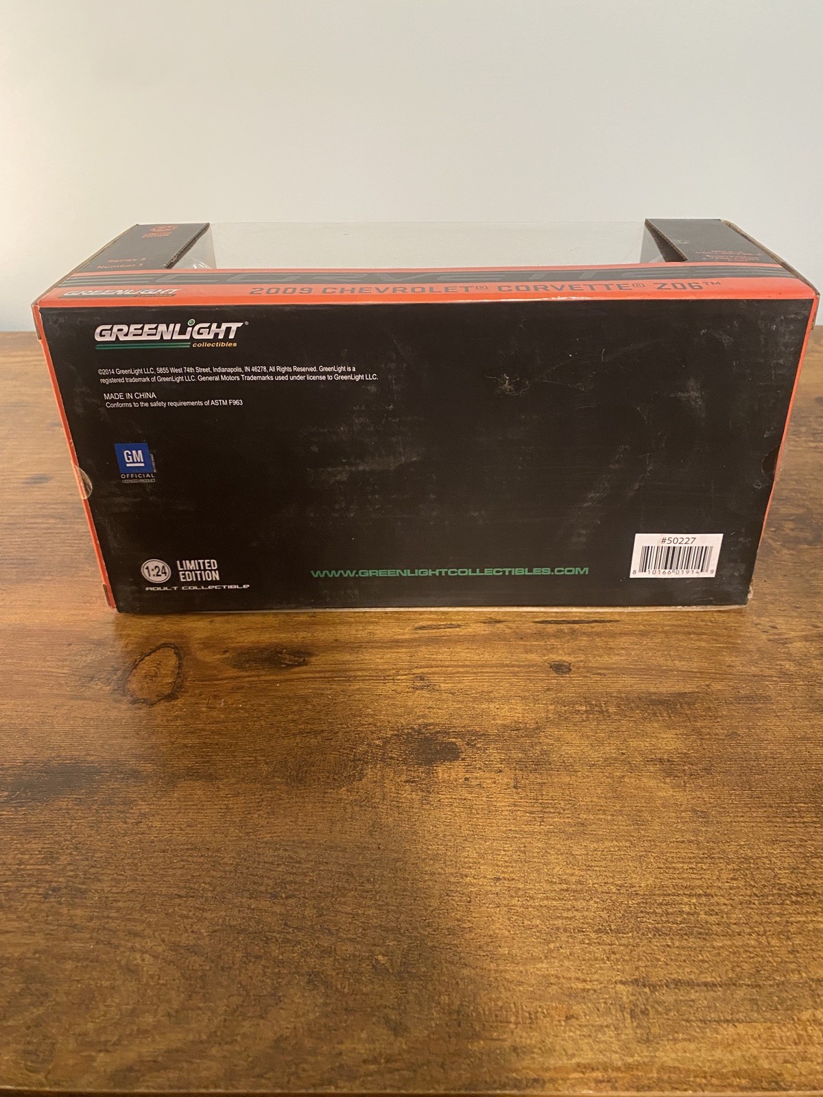 1/24 GREENLIGHT FRAM OIL 2009 CHEVROLET CORVETTE Z06 BLACK W/ORANGE STRIPS