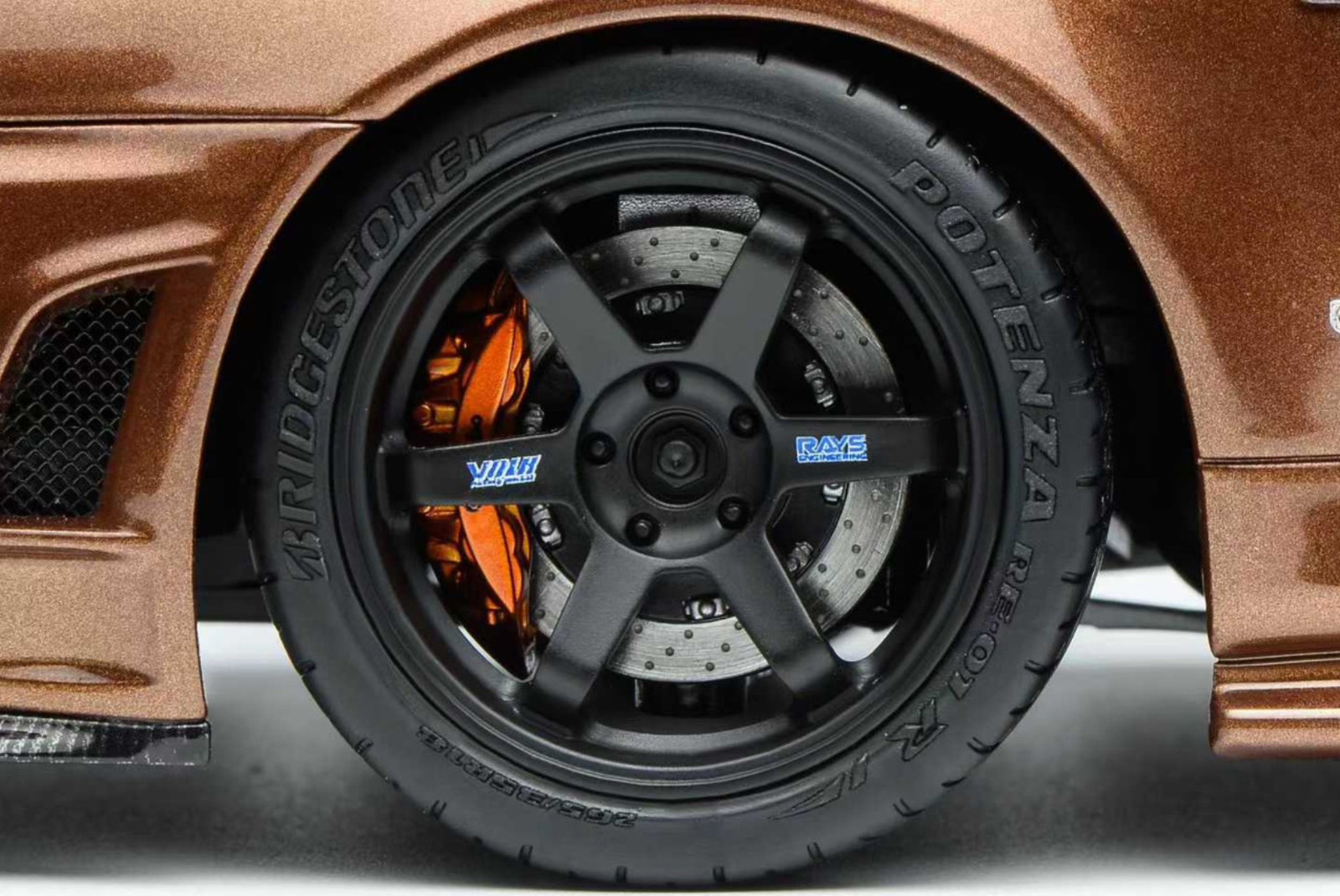 1/18 Motorhelix Nissan Skyline GT-R R34 in Metallic Bronze