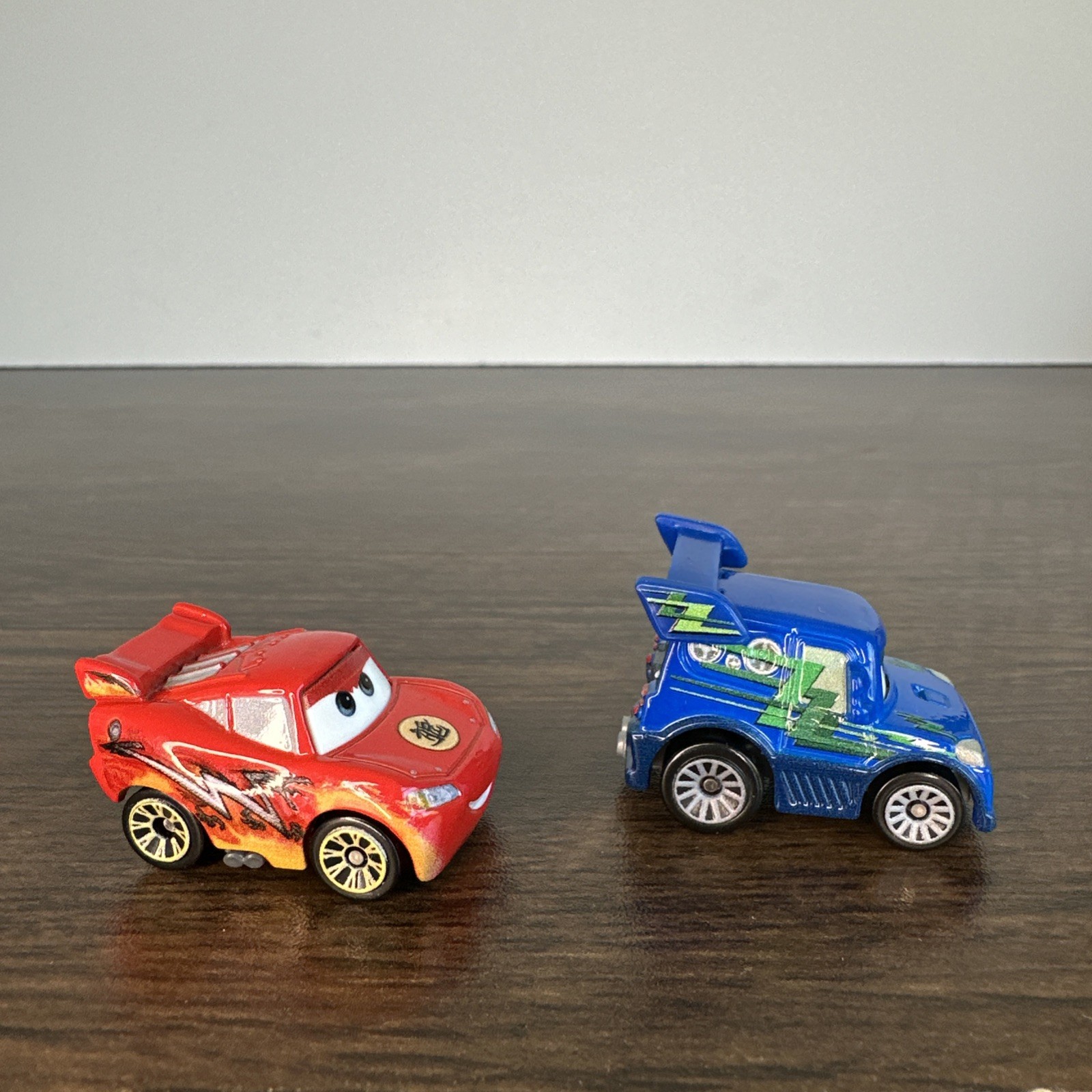 Disney Cars MINI Racers Dragon Lightning McQueen & Race O Rama DJ