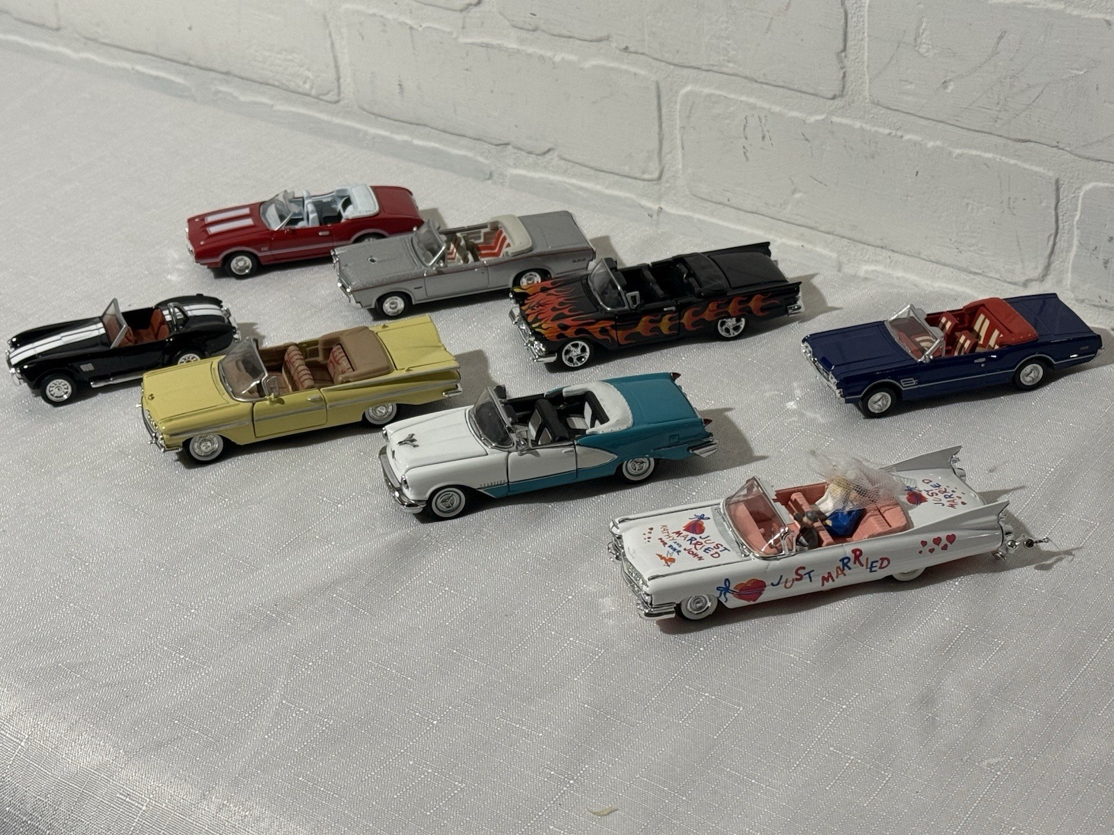 Lot of 8 Mixed 1/43 Convertible’s GTO Olds Cobra Impala Ford Cadillac Married