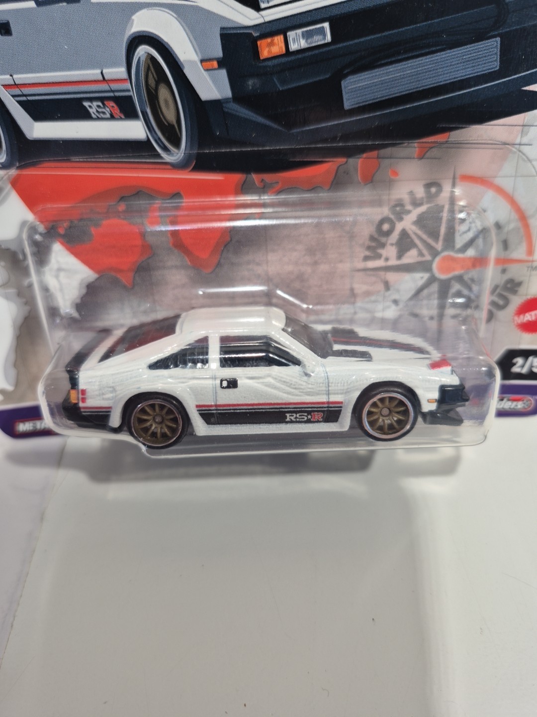 Hot Wheels 82 Toyota Supra World Tour 1/64 Premium Real Riders M17