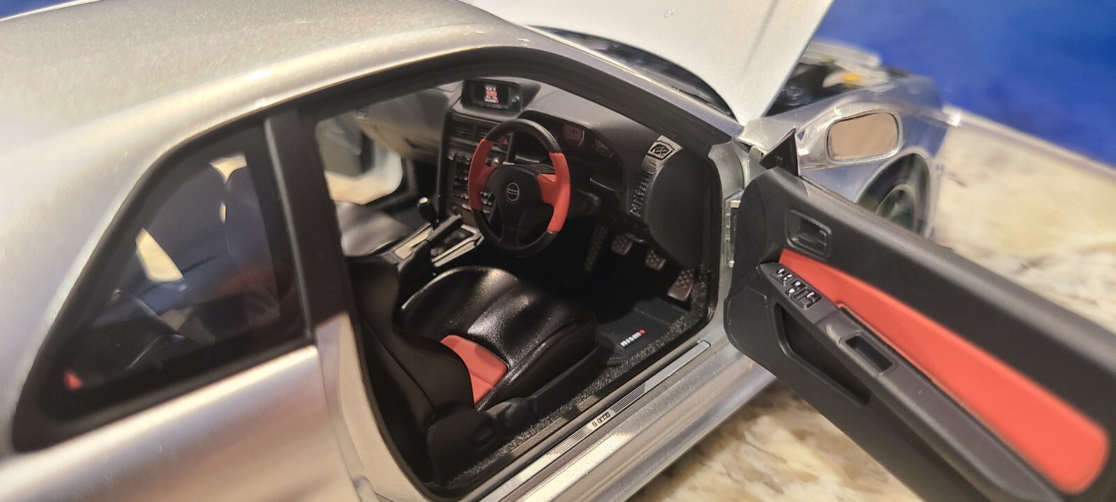 Nissan Skyline GT-R (R34) Z-Tune, Z-Tune Silver in 1:18 scale by AUTOart 77461